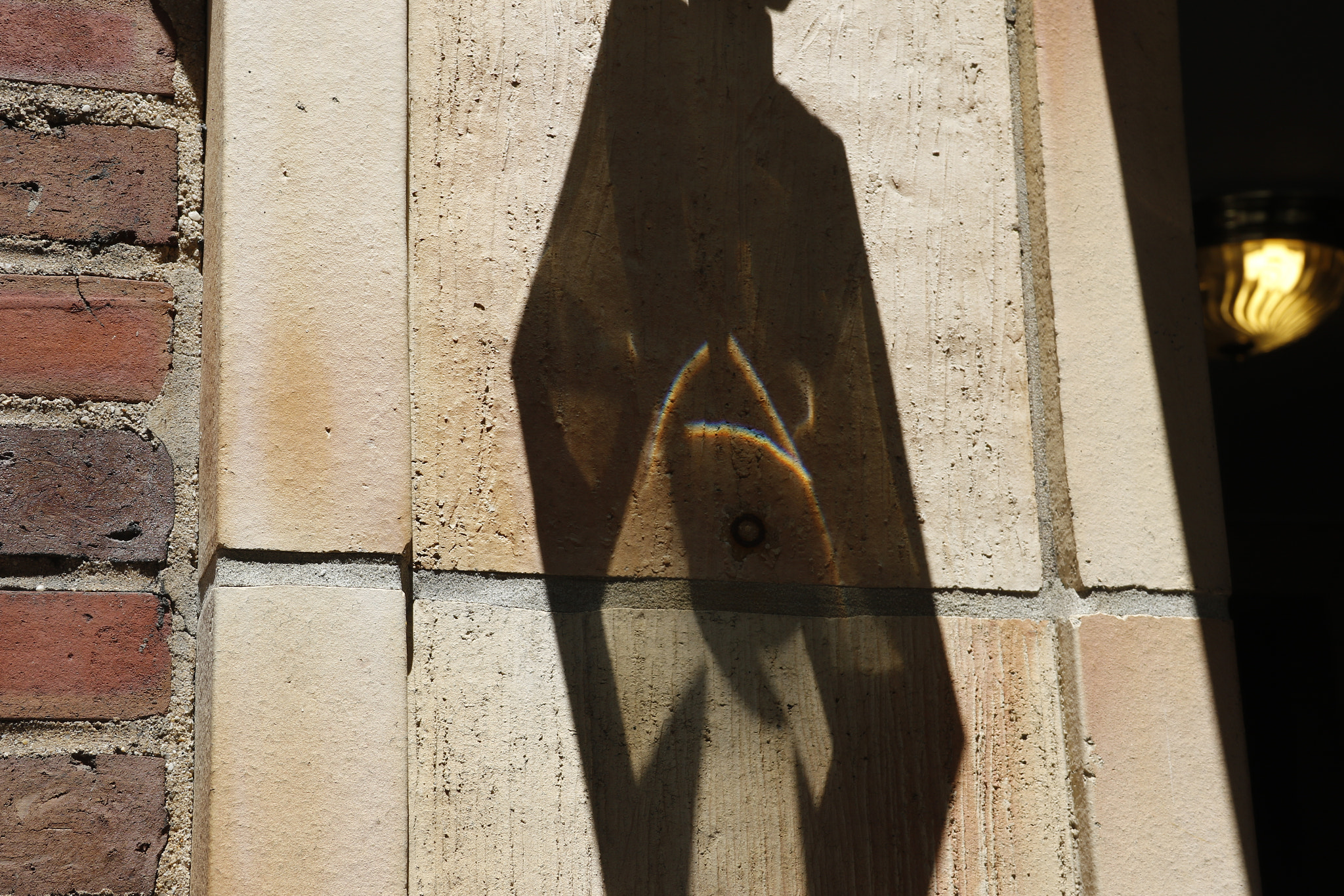 Canon EF-S 18-135mm F3.5-5.6 IS sample photo. A prism in sun light 5th av nyc usa 2016 photography