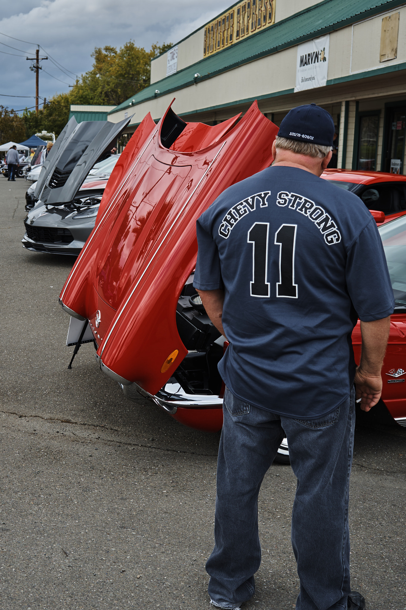 Sony a7 II sample photo. Gazing at the red c1 corvette photography