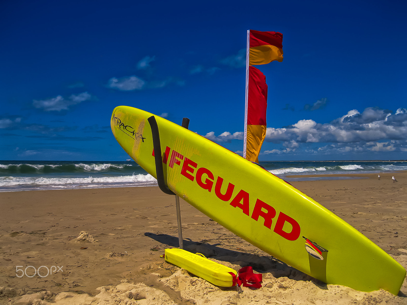 Canon PowerShot A3100 IS sample photo. Life savers surf board on the beach photography