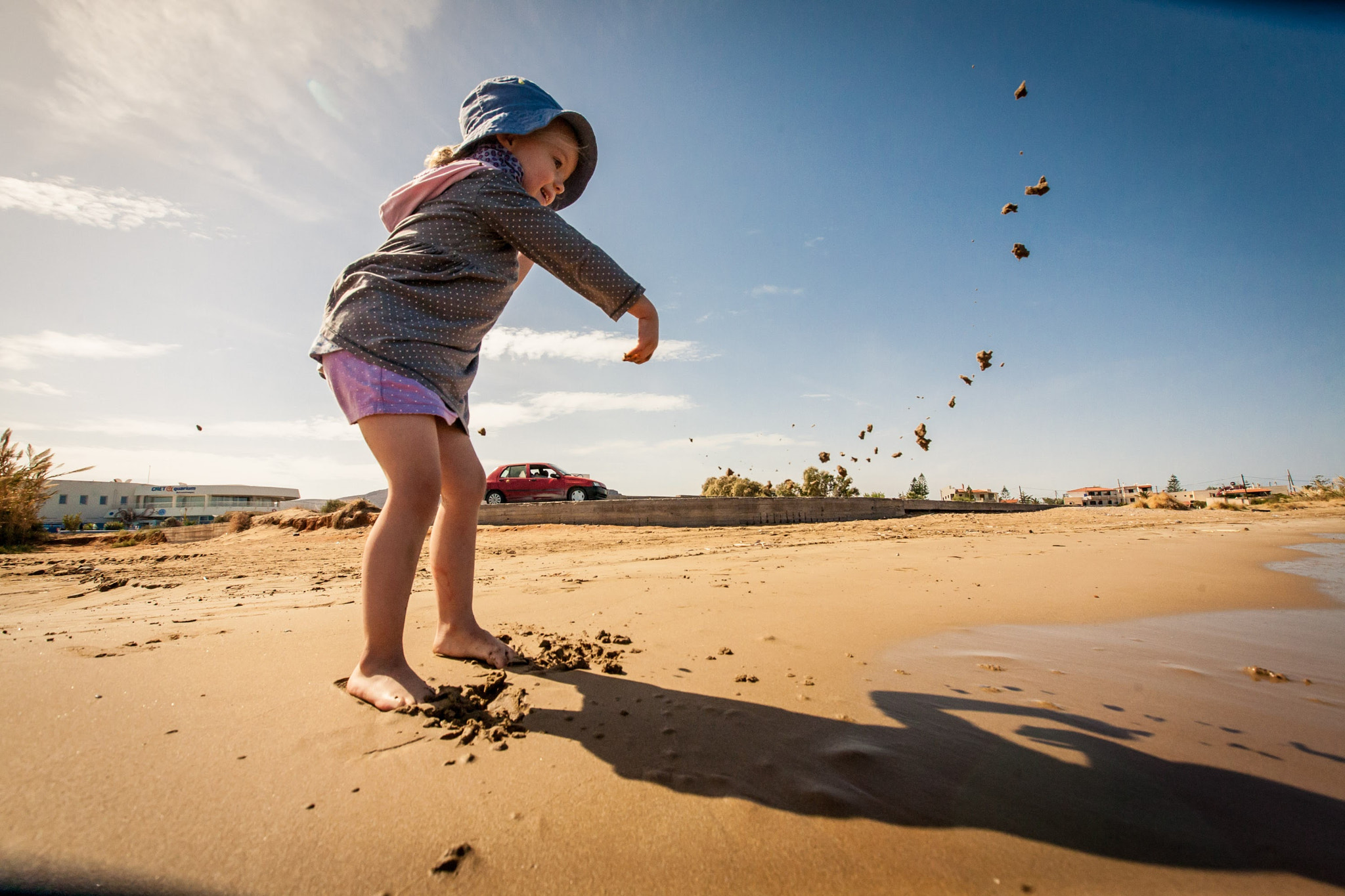 Canon EF 16-35mm F2.8L II USM sample photo. Girl throwing sand photography