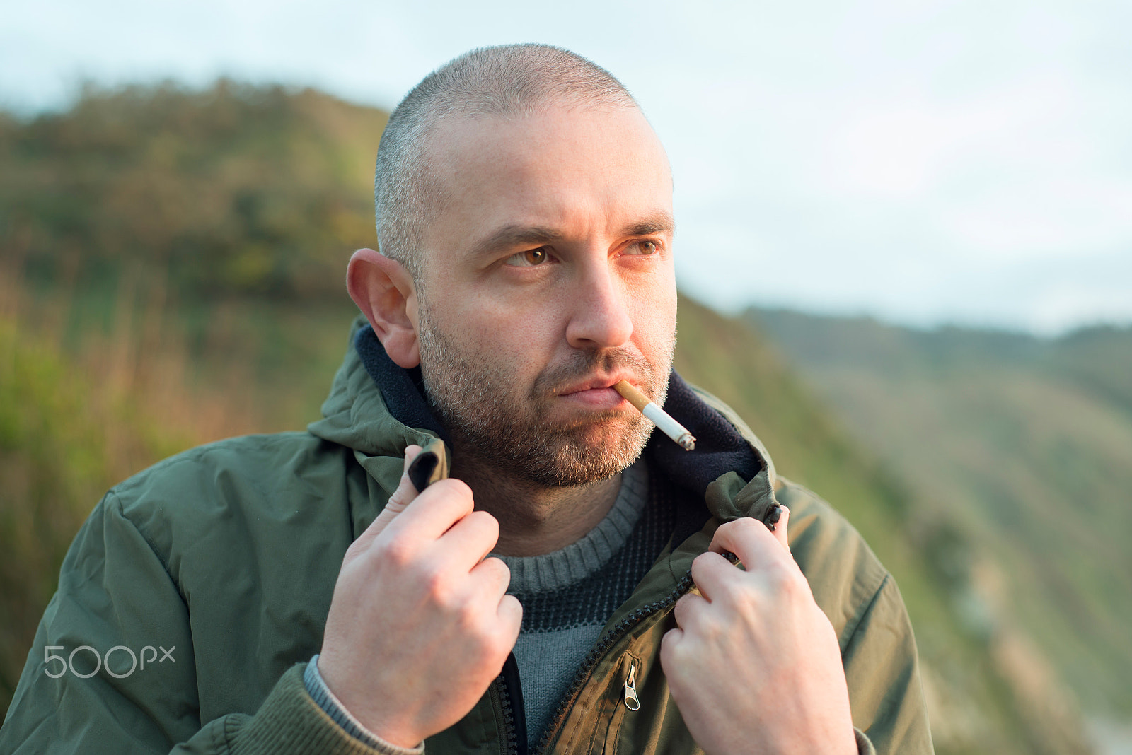 Nikon D610 + AF Nikkor 50mm f/1.8 sample photo. Portrait of a man smoking a cigarette photography