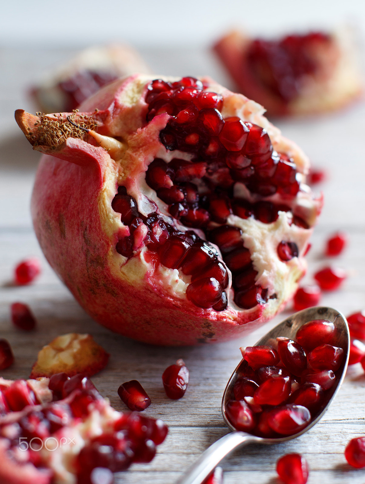 Canon EOS 650D (EOS Rebel T4i / EOS Kiss X6i) + Canon EF 50mm F1.2L USM sample photo. Open fresh ripe pomegranates photography