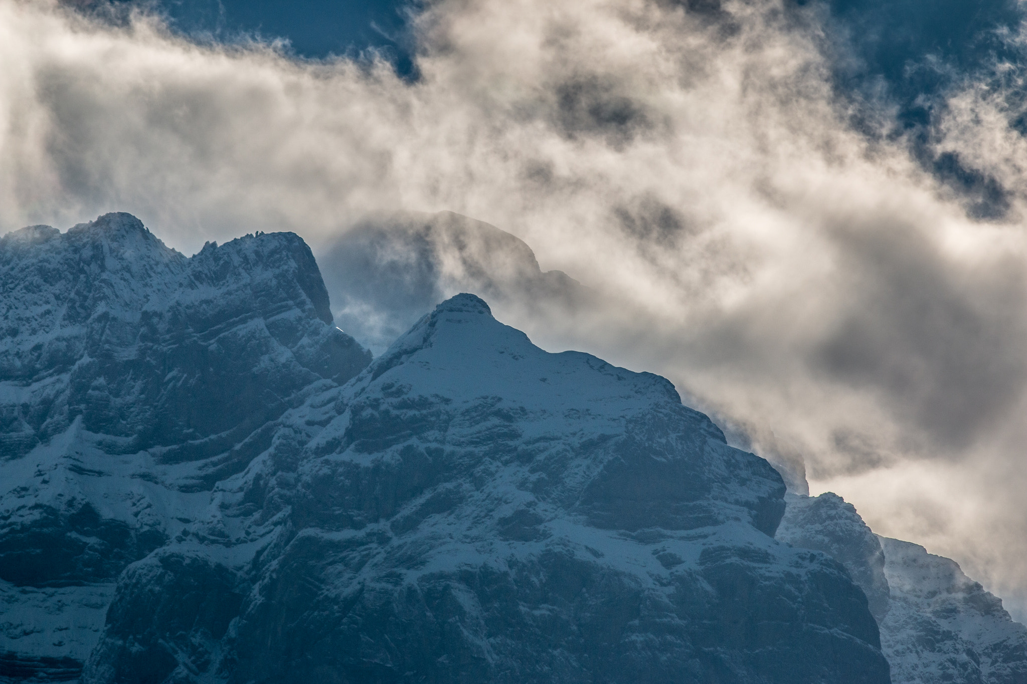 Canon EF 200mm f/2.8L II + 2x sample photo. Clouds & cliffs iii photography