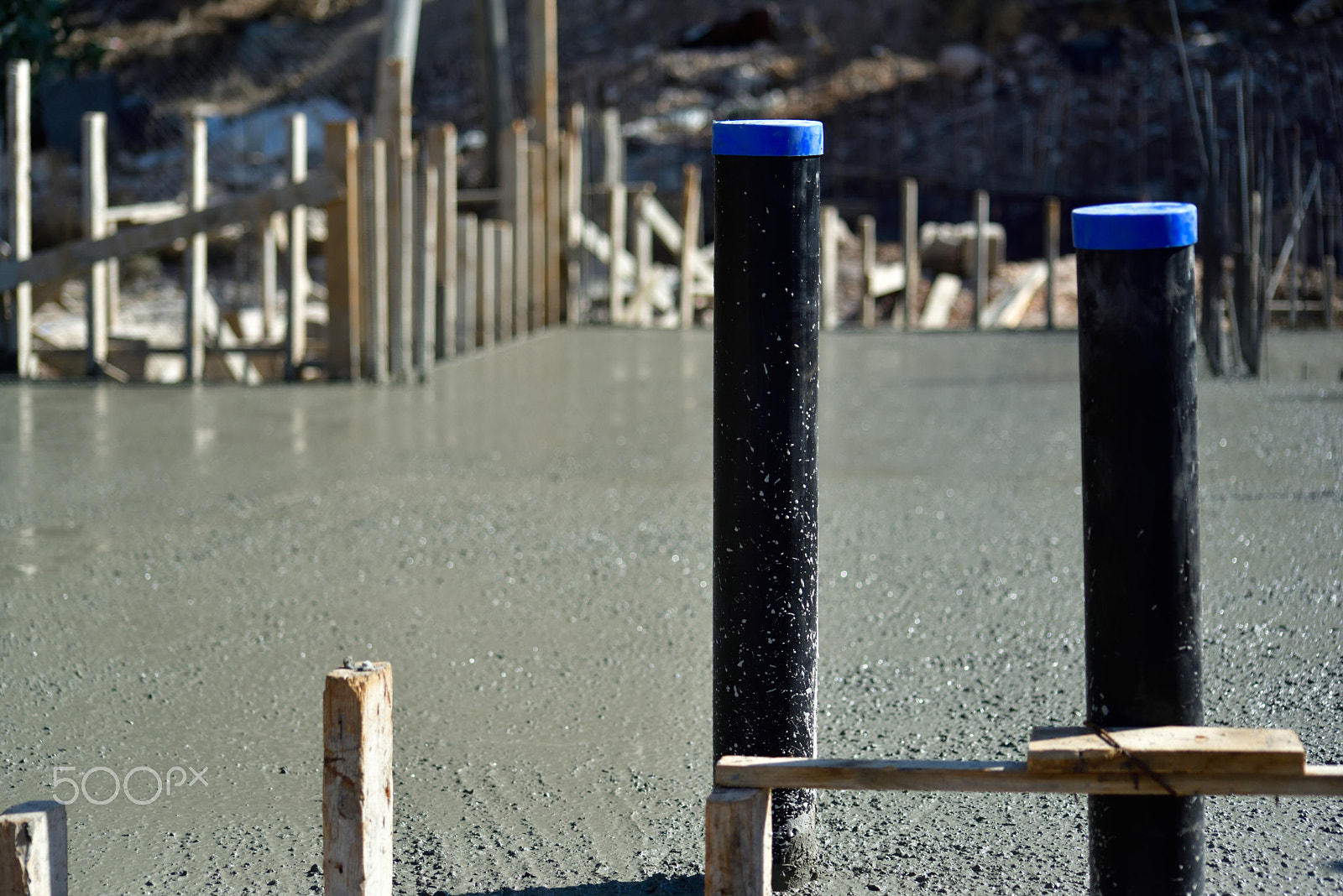 Sigma 70-300mm F4-5.6 APO Macro Super II sample photo. Construction journal - fresh concrete floor photography