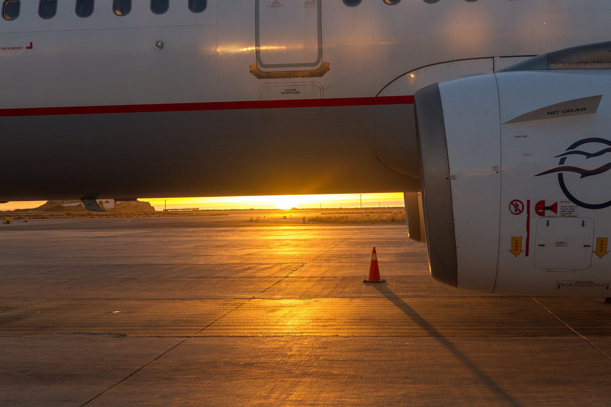 Canon EOS 7D + Sigma 18-35mm f/1.8 DC HSM sample photo. Sunrise in airport photography