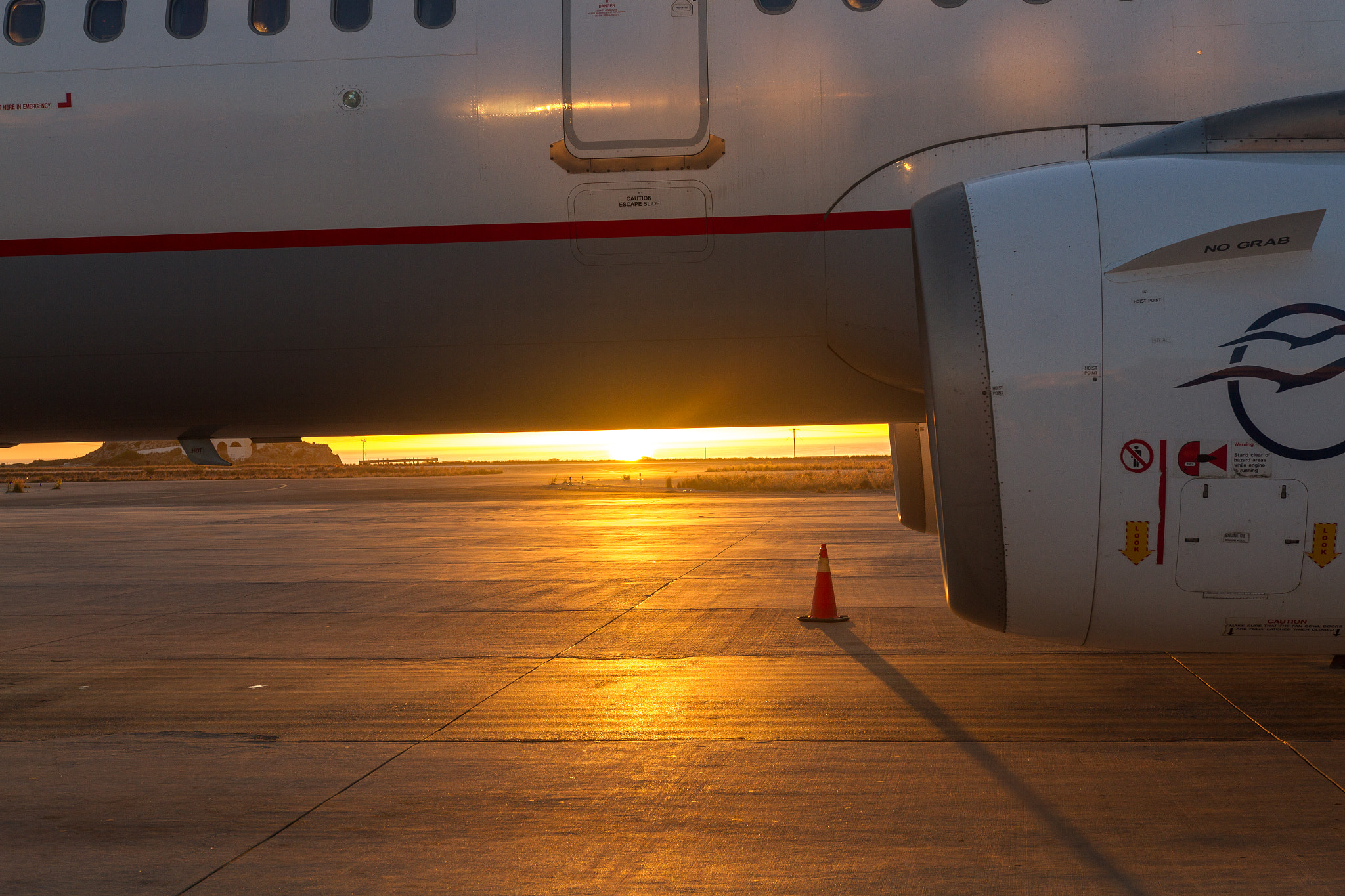 Sigma 18-35mm f/1.8 DC HSM sample photo. Sunrise in airport photography