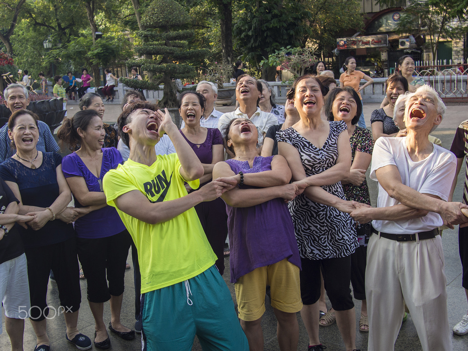 Olympus OM-D E-M5 + Panasonic Lumix G 20mm F1.7 ASPH sample photo. Laughing yoga photography