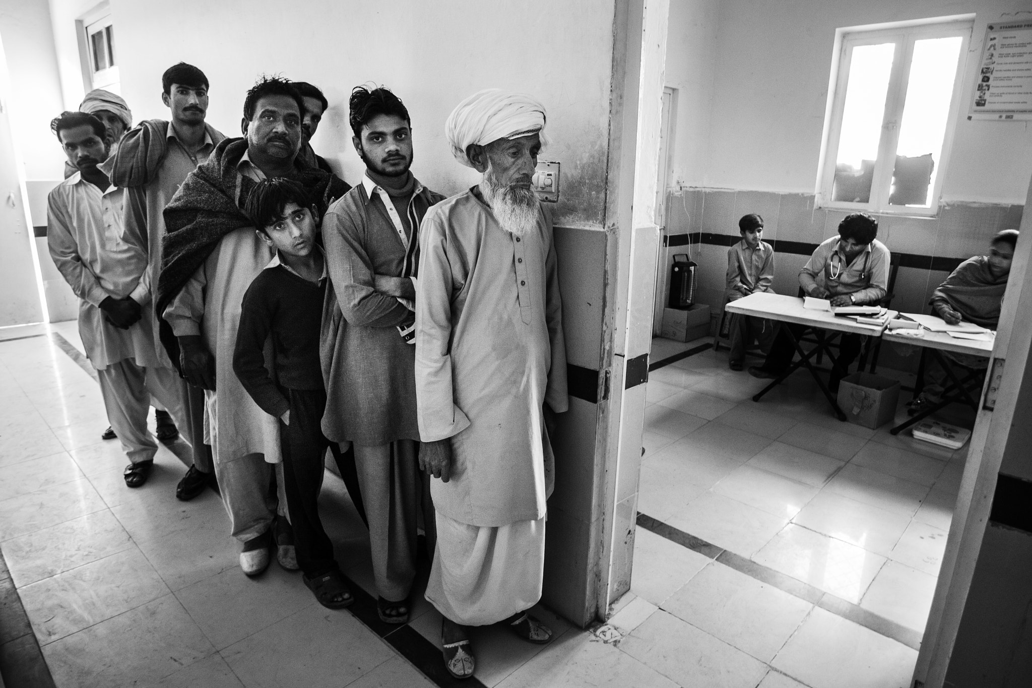 Canon EOS-1D Mark III sample photo. Queuing for medical care photography