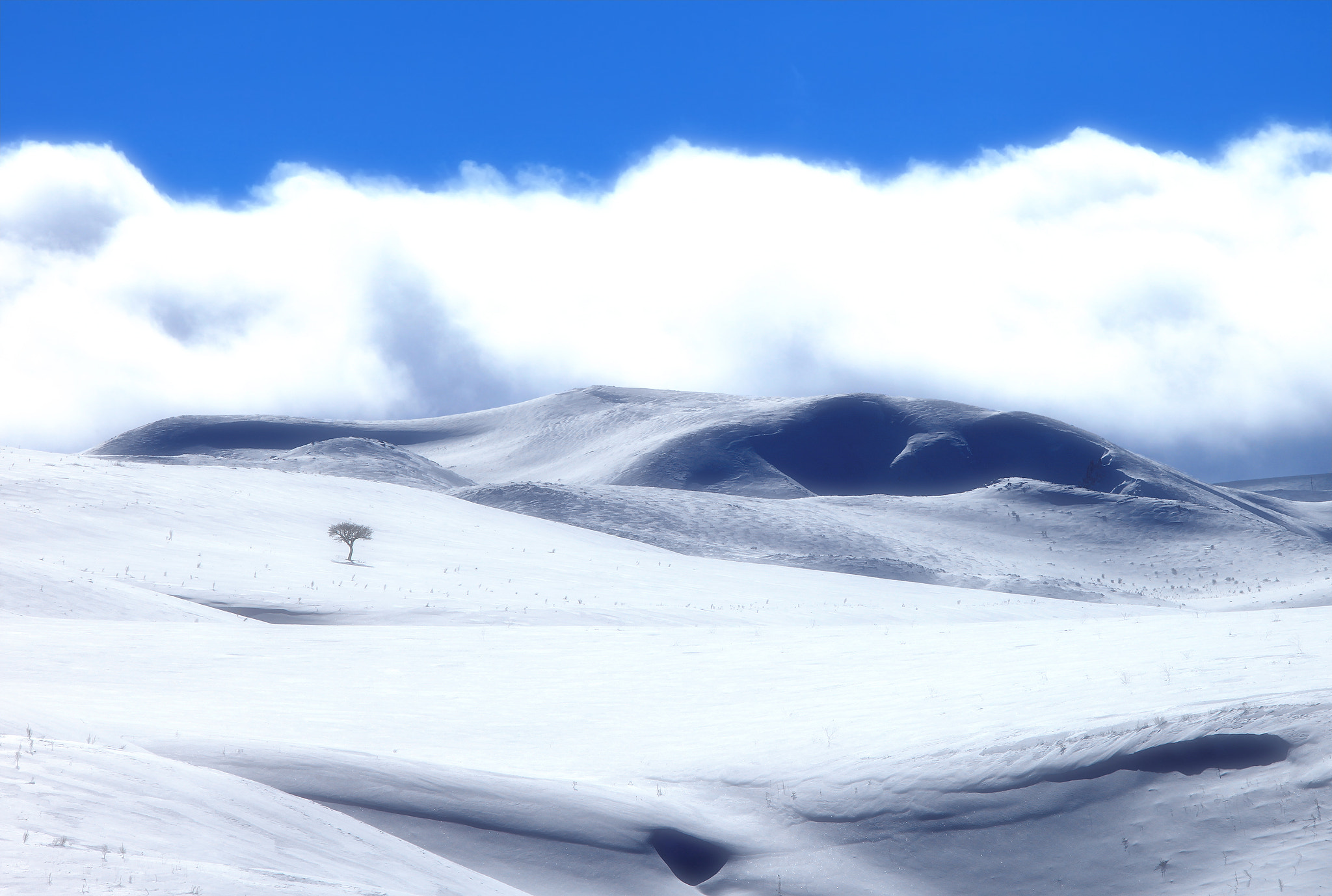 Canon EF 300mm F4L IS USM sample photo. Snowy mountain photography