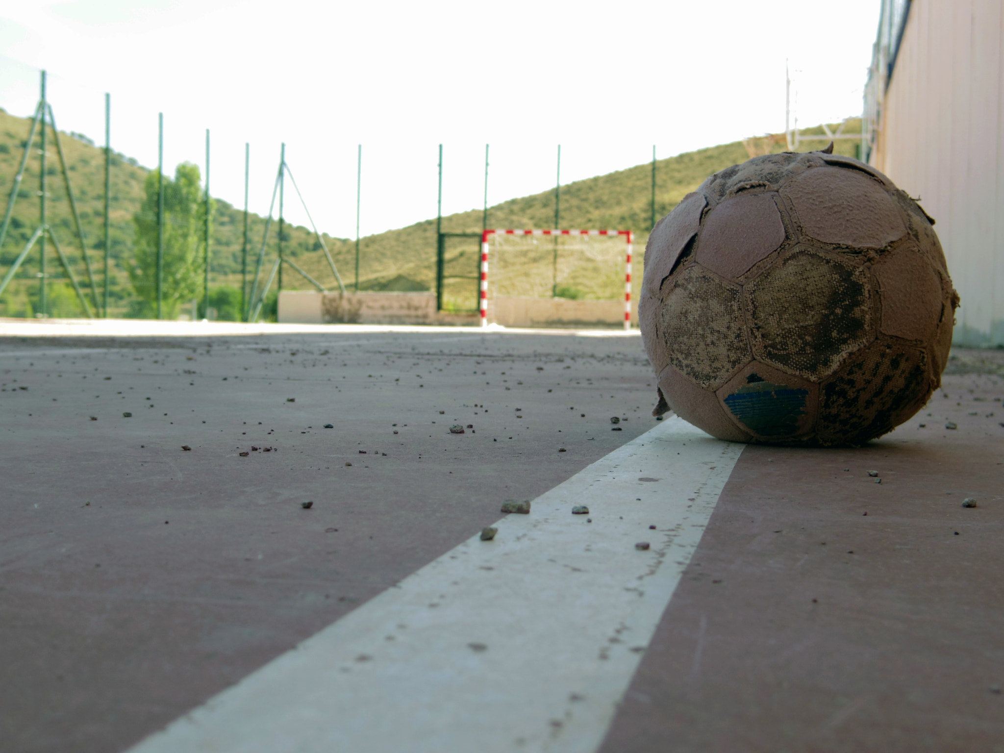 Pentax Q sample photo. Dirty ol' ball photography