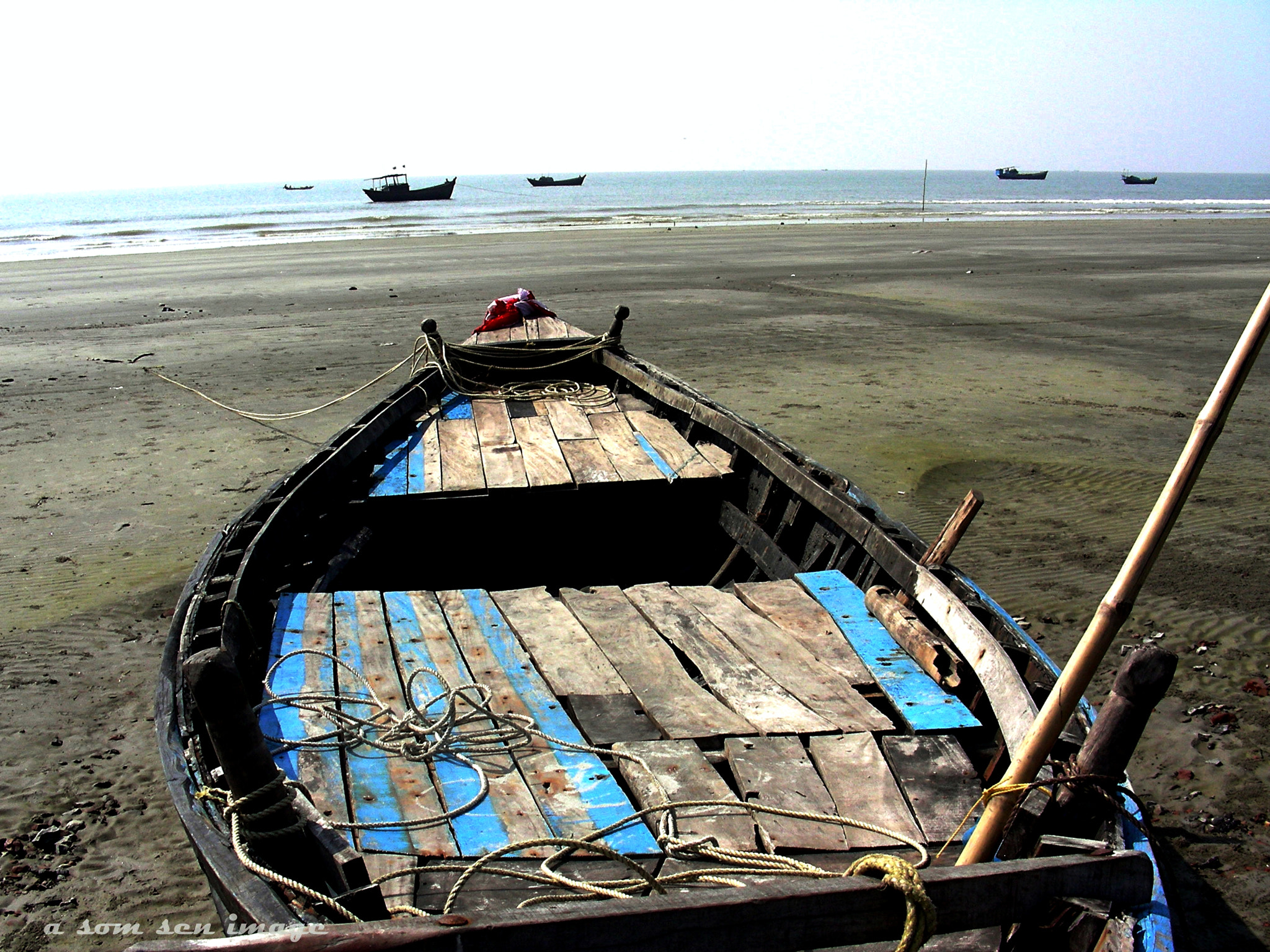 Nikon COOLPIX S4 sample photo. The boat at sea shore photography