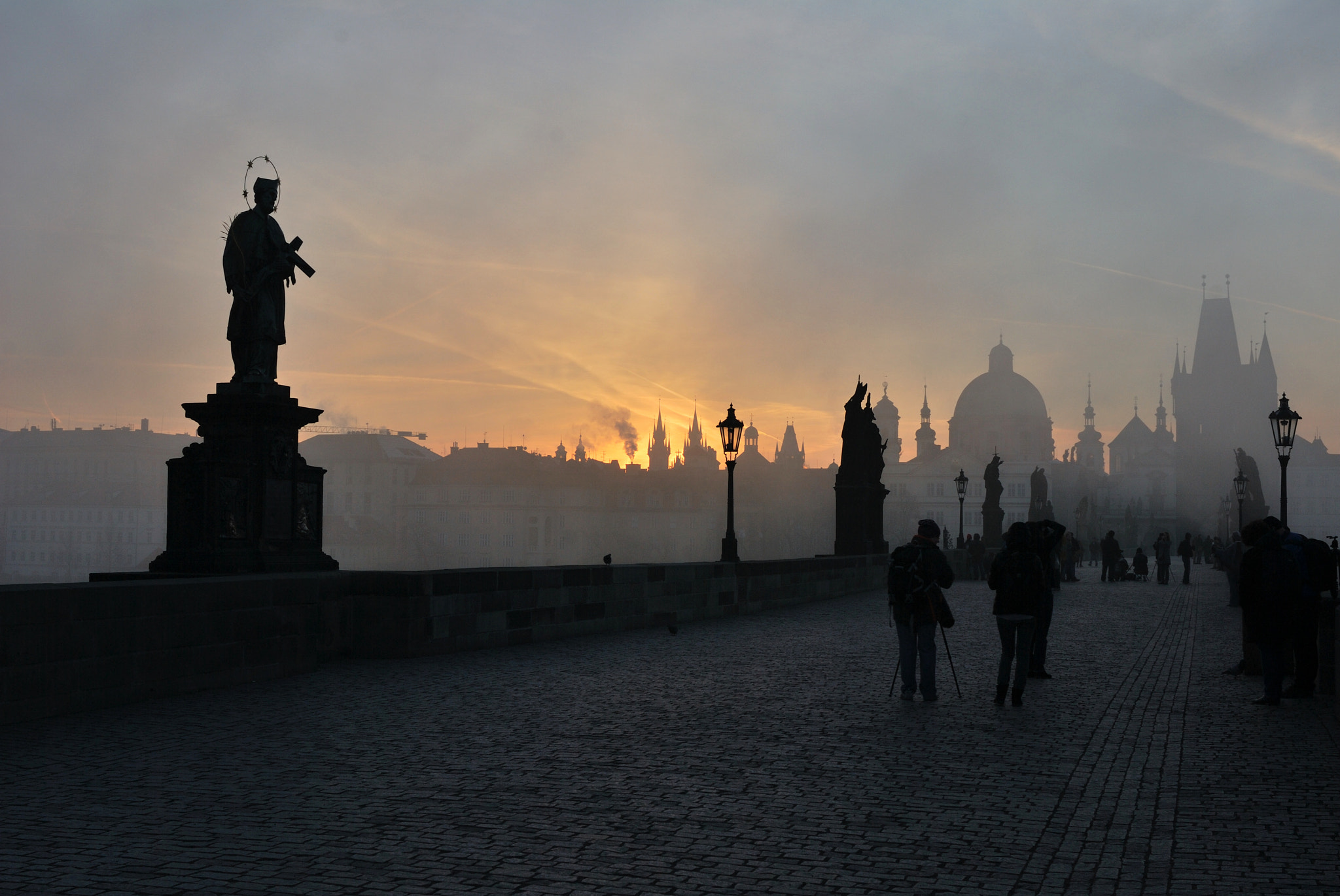 Nikon D60 + Nikon AF-S Nikkor 28mm F1.8G sample photo. Sun rising above prague photography