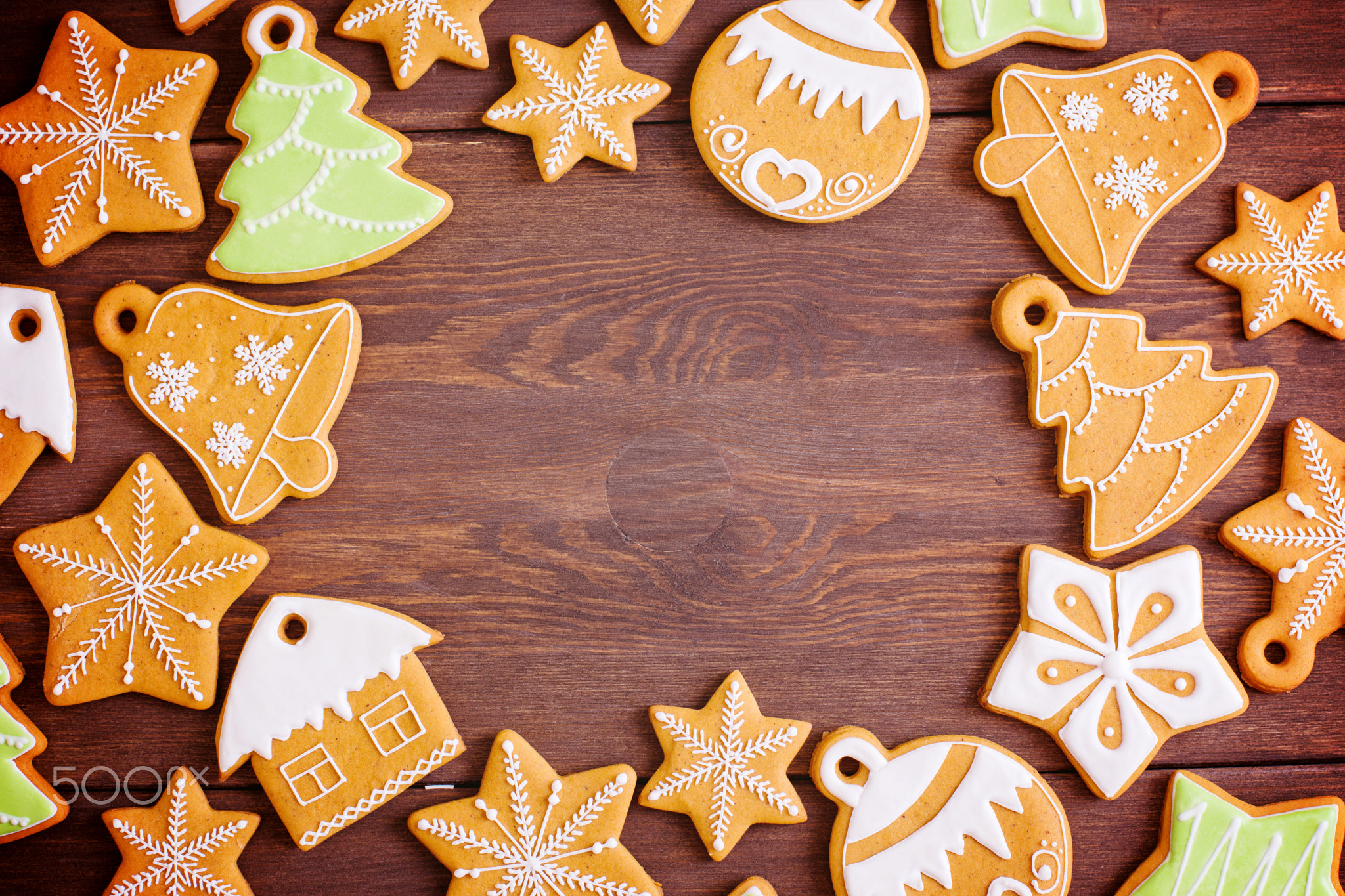 Christmas homemade gingerbread on a wooden background