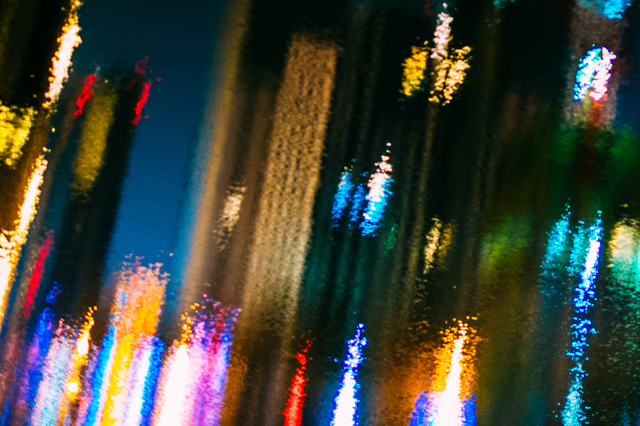 Olympus OM-D E-M5 + Panasonic Leica DG Summilux 25mm F1.4 II ASPH sample photo. A city reflected photography