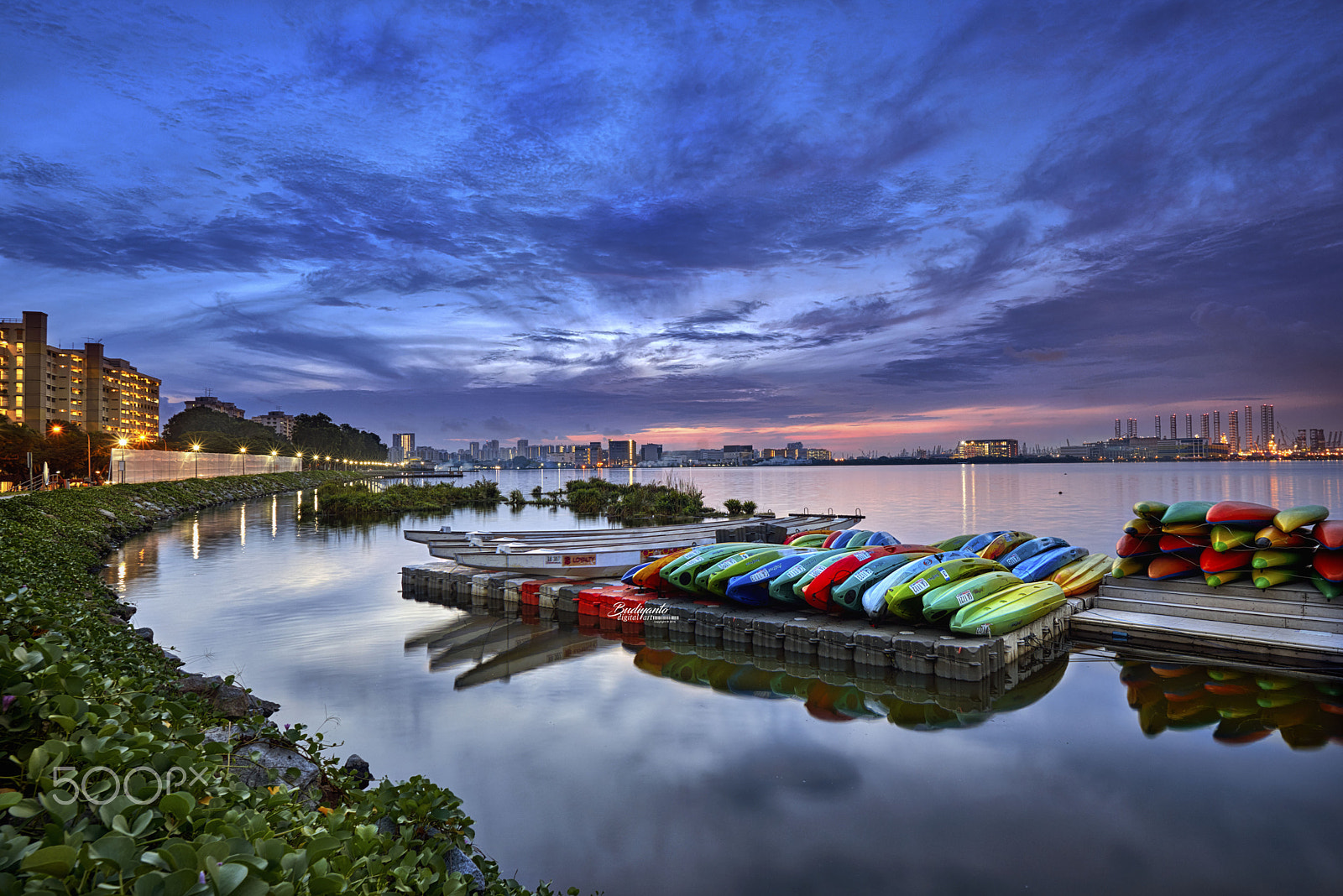 Nikon AF-S Nikkor 20mm F1.8G ED sample photo. Colorful canoes at bay photography