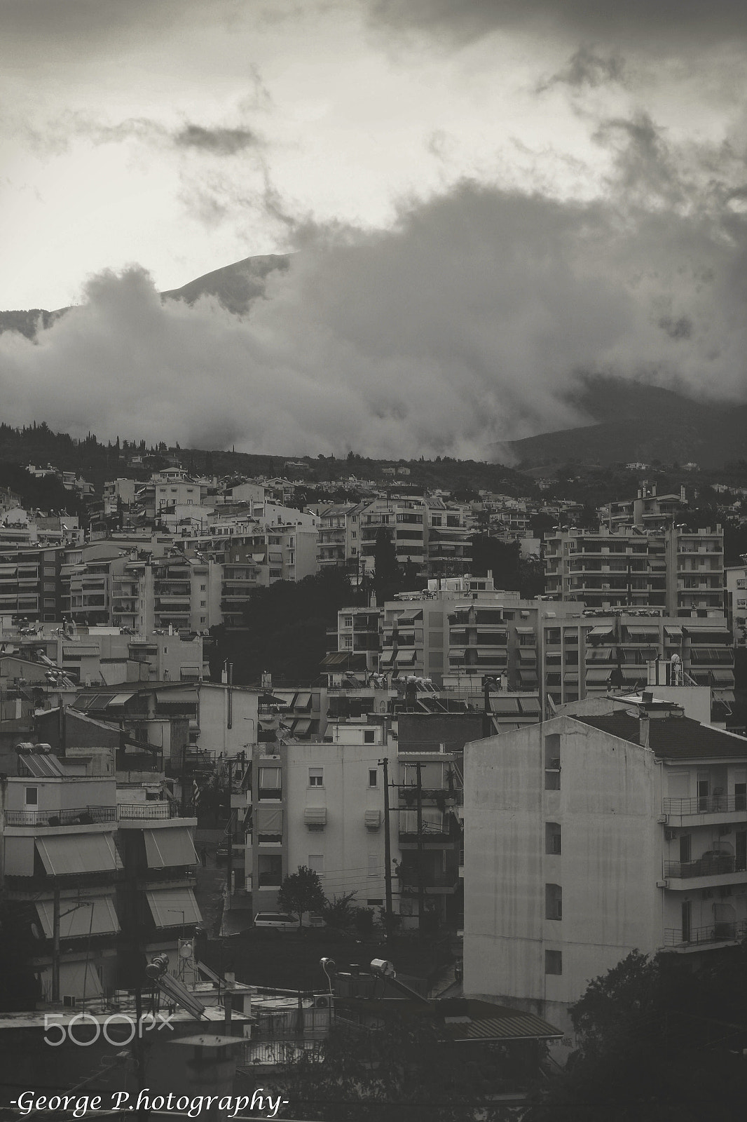 Canon EF 35-80mm f/4-5.6 sample photo. -clouds- photography