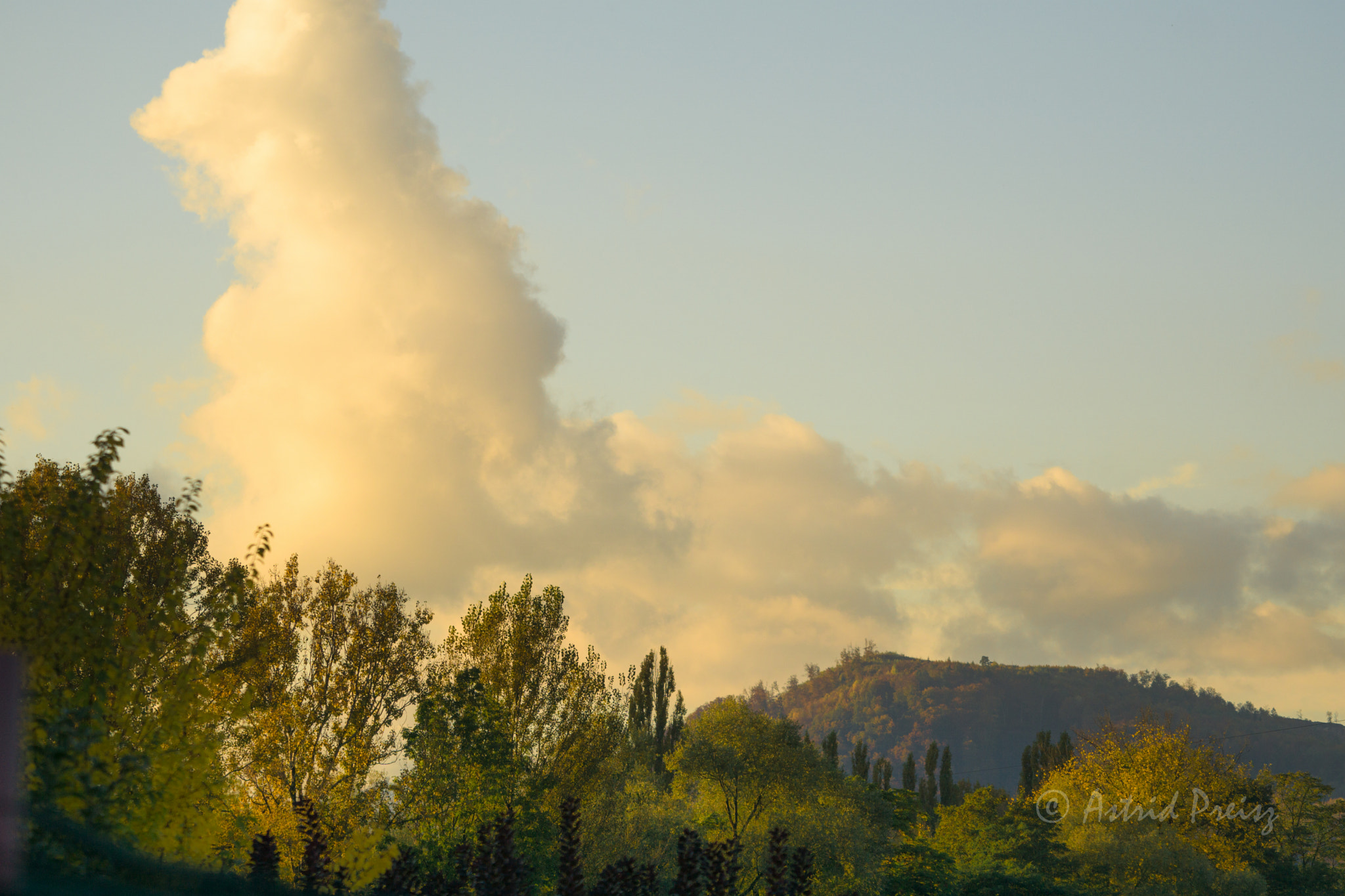 Sony FE 70-300mm F4.5-5.6 G OSS sample photo. Autumn clouds photography