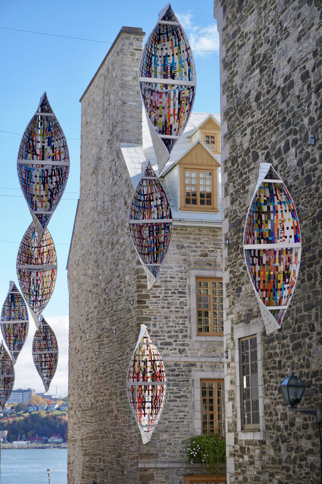 Sony E 18-50mm F4-5.6 sample photo. Hanging canoes in quebec city photography
