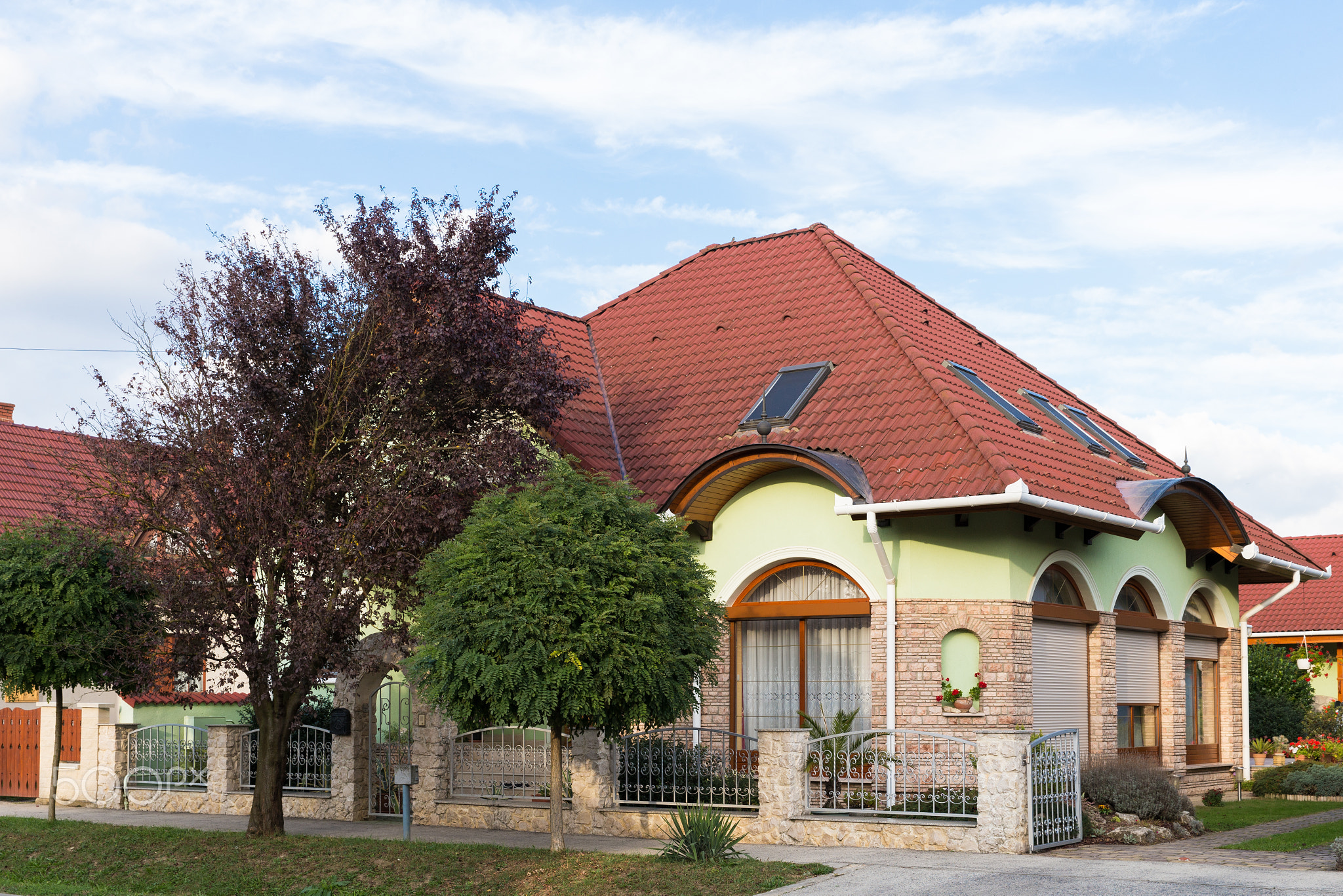 Detached house. Well-kept. Beautiful house. Detached house with ornamental trees and flowers around.