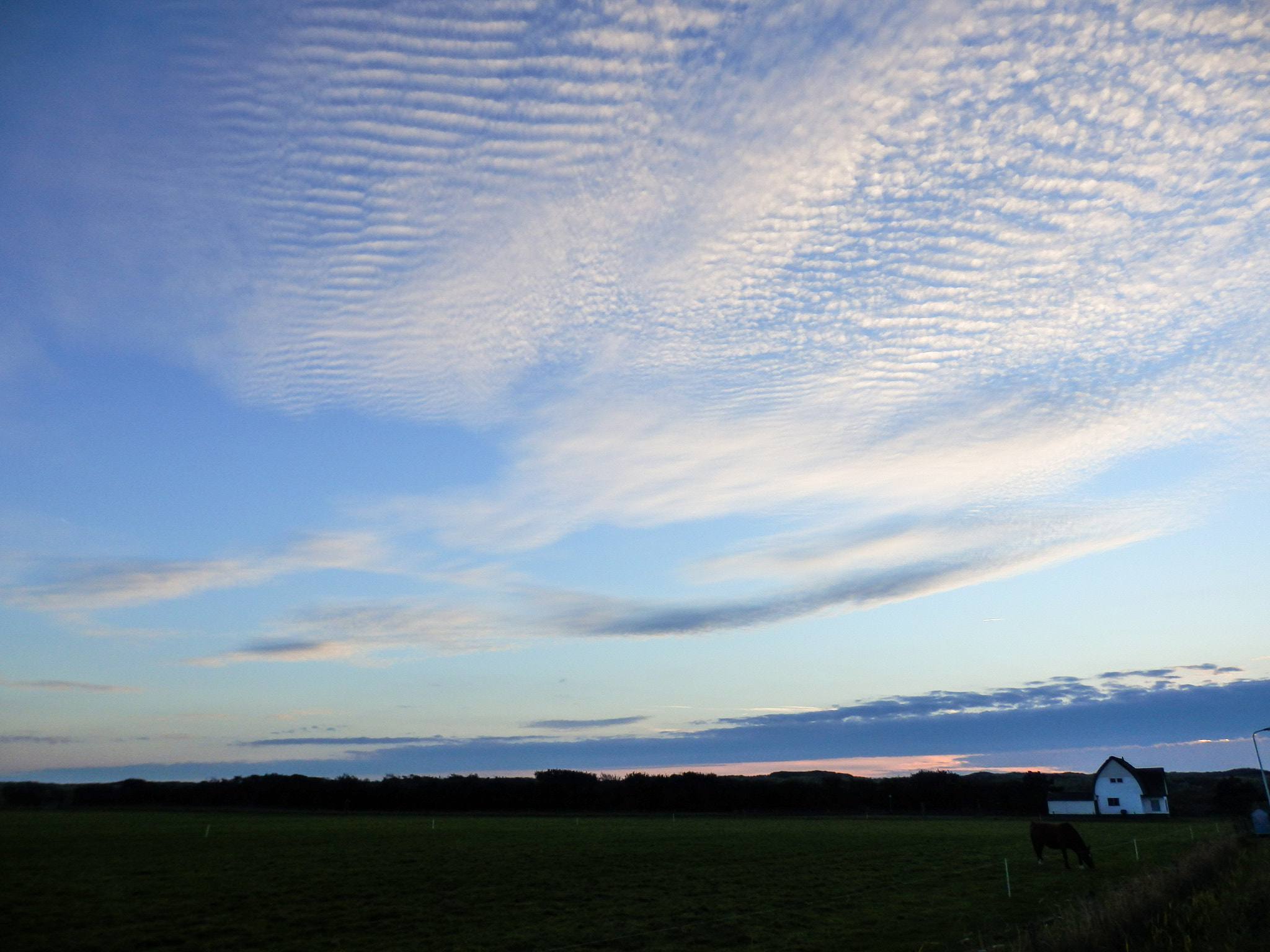 Olympus SZ-31MR sample photo. Beautiful clouds over the island photography