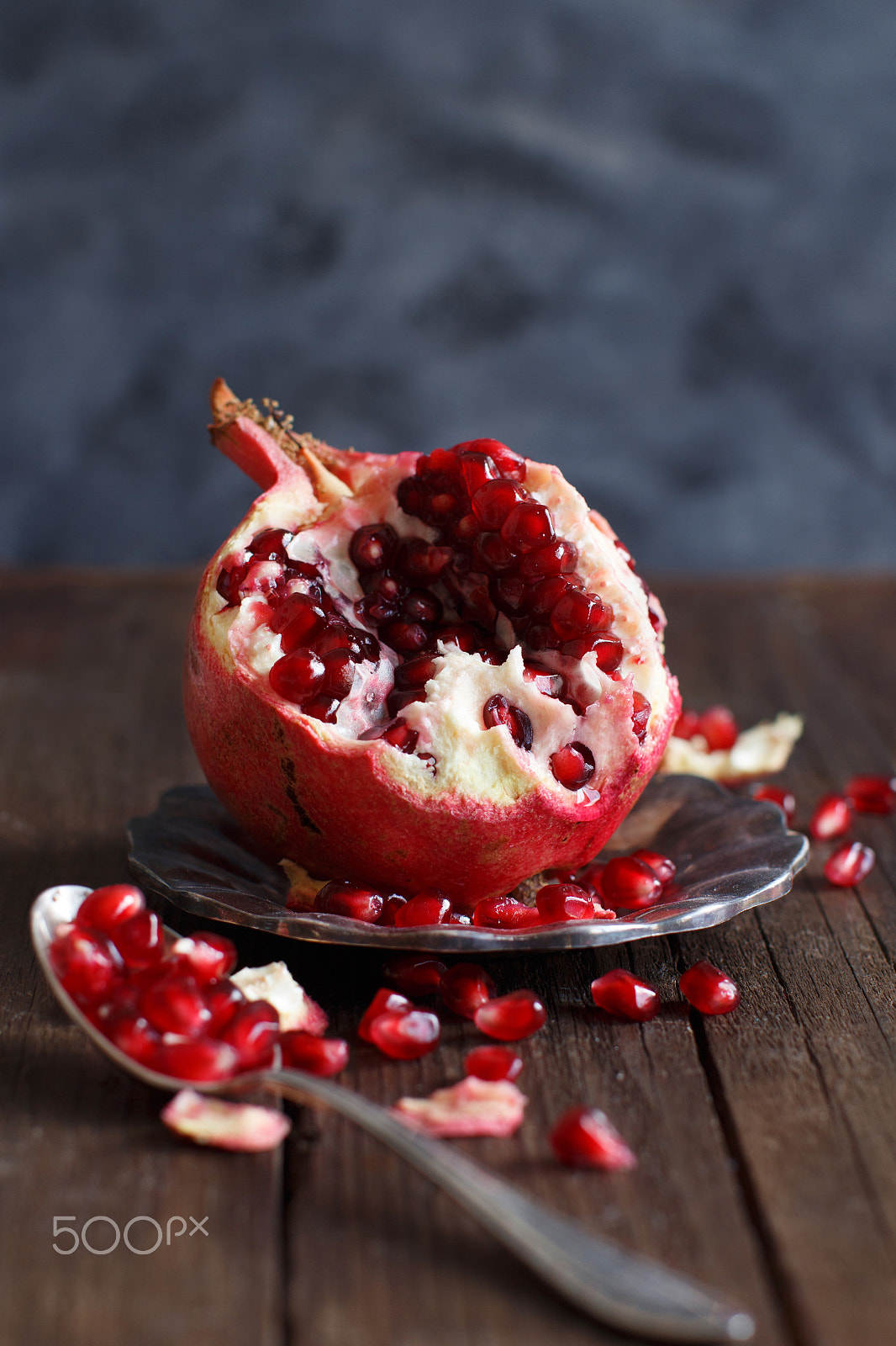 Canon EOS 650D (EOS Rebel T4i / EOS Kiss X6i) + Canon EF 50mm F1.2L USM sample photo. Open fresh ripe pomegranates photography