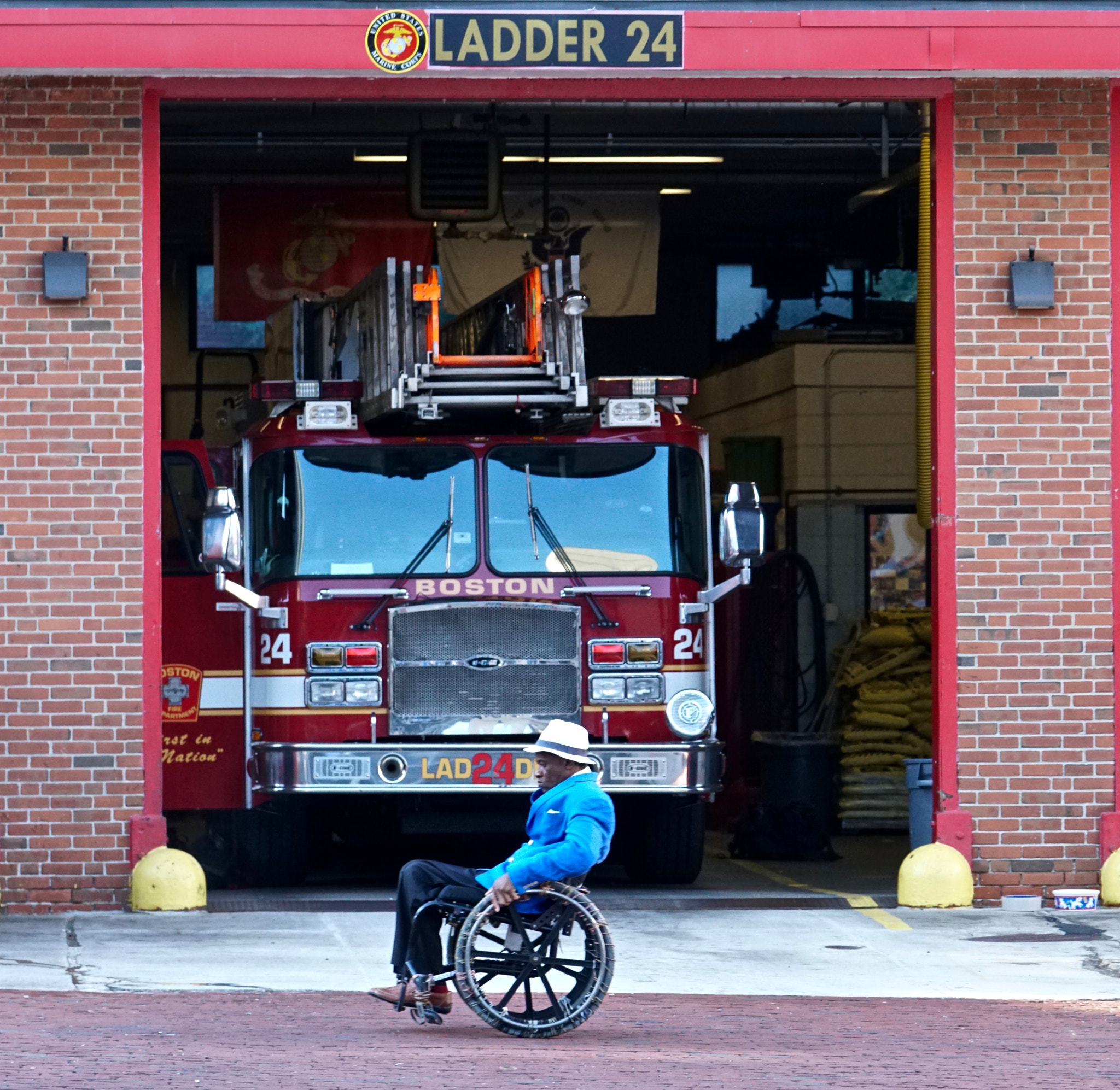 Sony a6300 + Sony FE 70-200mm F2.8 GM OSS sample photo. Wheel chair and fire station photography