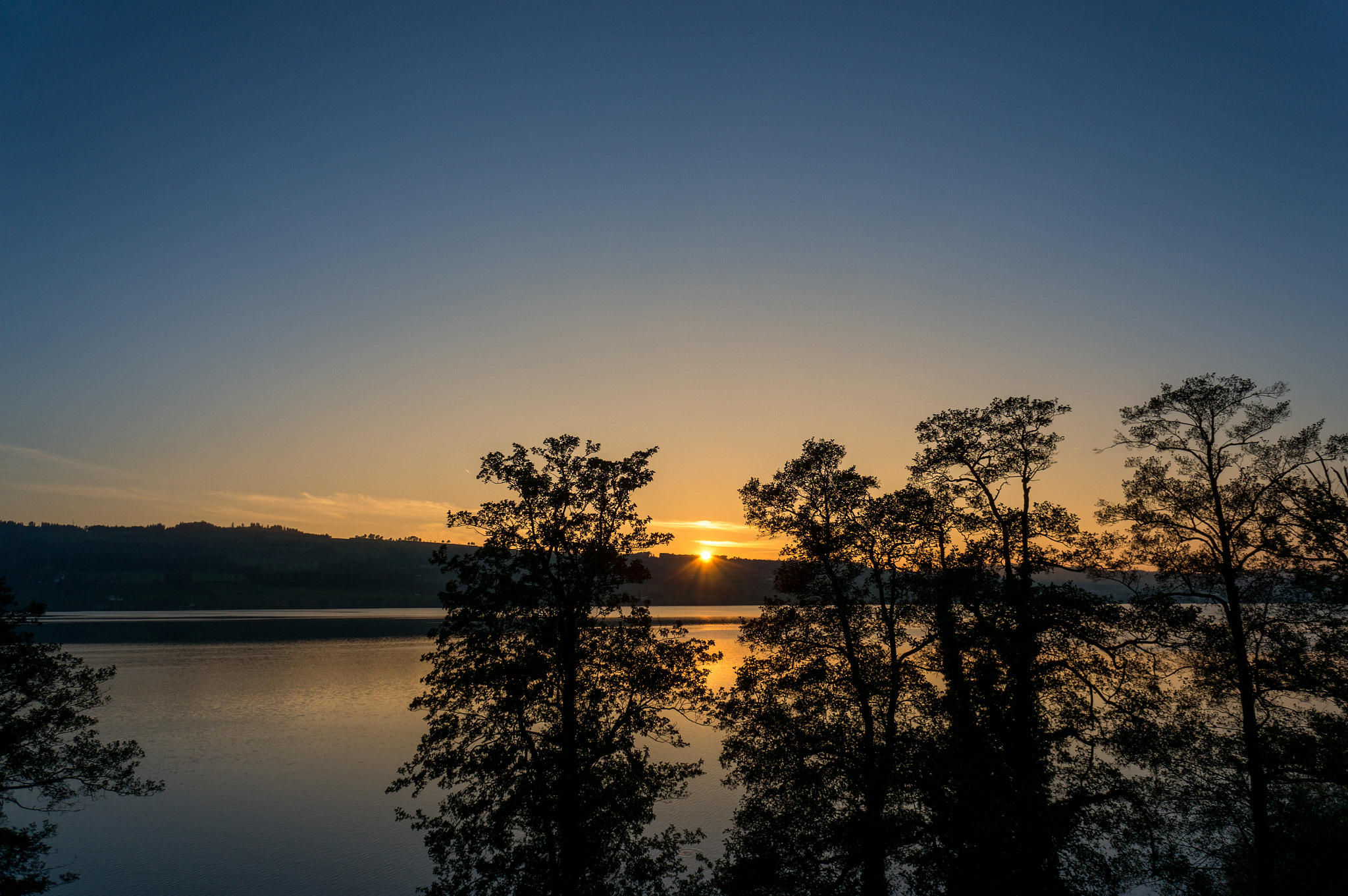 Sony Alpha NEX-5T + Sony E 16mm F2.8 sample photo. Sunset in switzerland photography