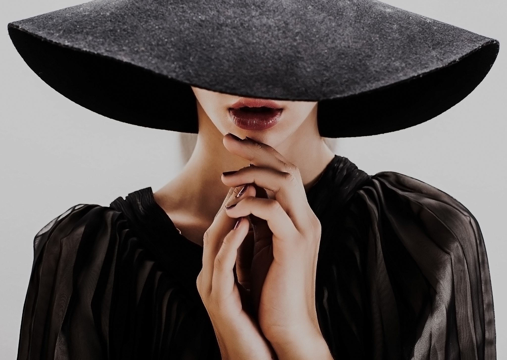 Nikon D3 sample photo. Girl in black hat touching face and lips photography