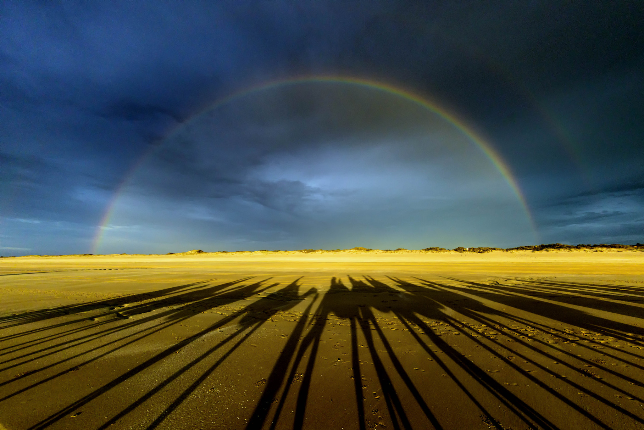 Nikon D810 + Nikon AF Fisheye-Nikkor 16mm F2.8D sample photo. Double rainbow and camels on cable beach, broome photography