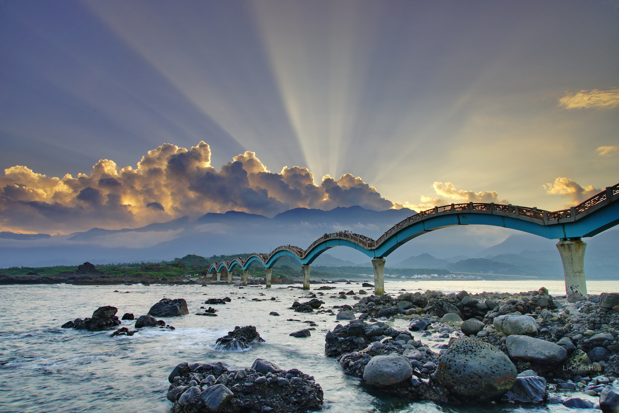 Sony a7 II + Sony FE 24-240mm F3.5-6.3 OSS sample photo. Rays of light over a bridge photography