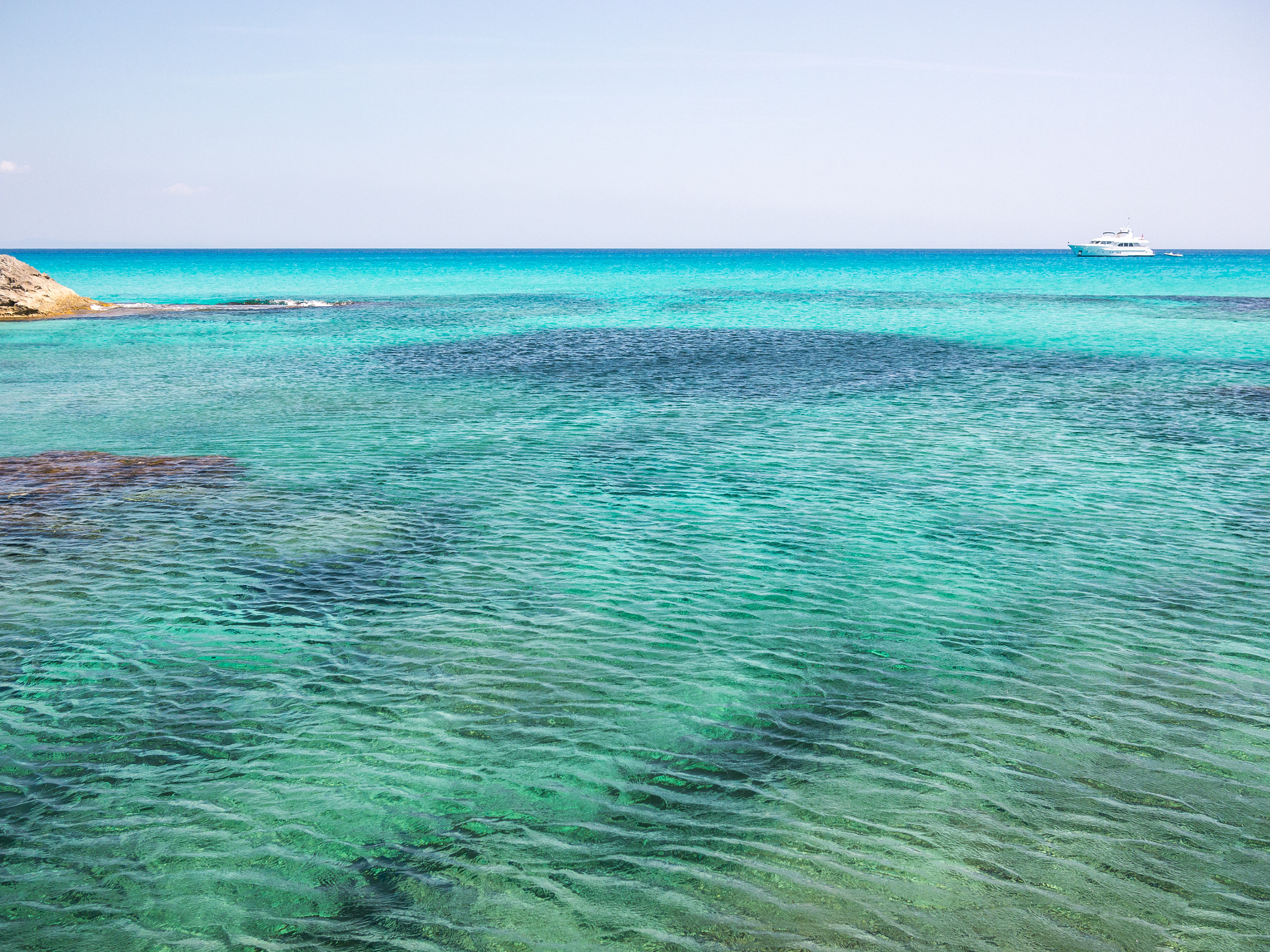 Panasonic Lumix DMC-G5 + Panasonic Lumix G 20mm F1.7 ASPH sample photo. Formentera blue sea photography