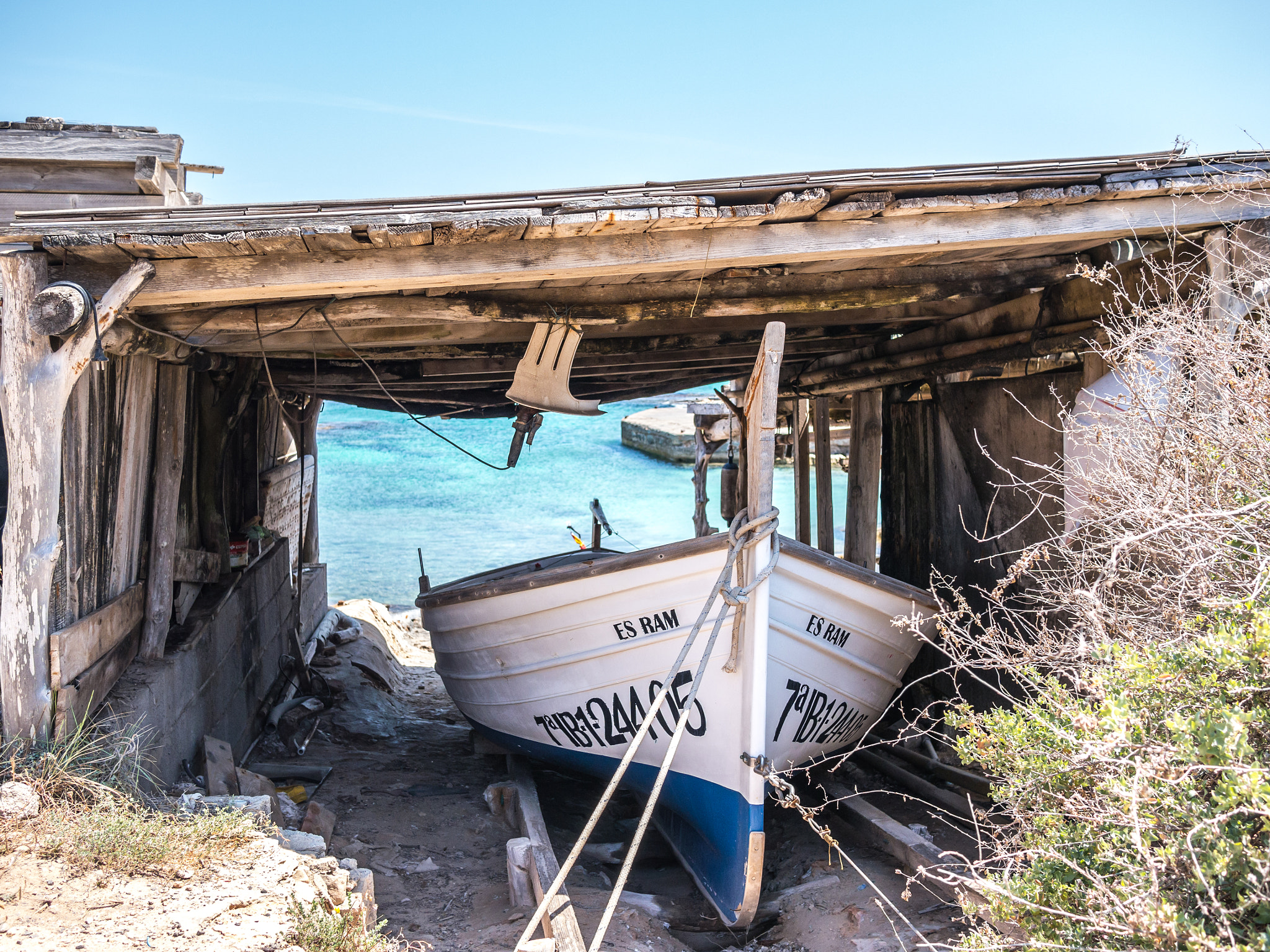 Panasonic Lumix DMC-G5 + Panasonic Lumix G 20mm F1.7 ASPH sample photo. Boat in es calo, formentera photography