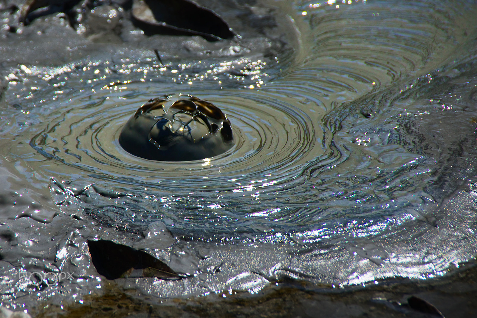 Sony Alpha DSLR-A580 sample photo. Bursting mud bubble photography