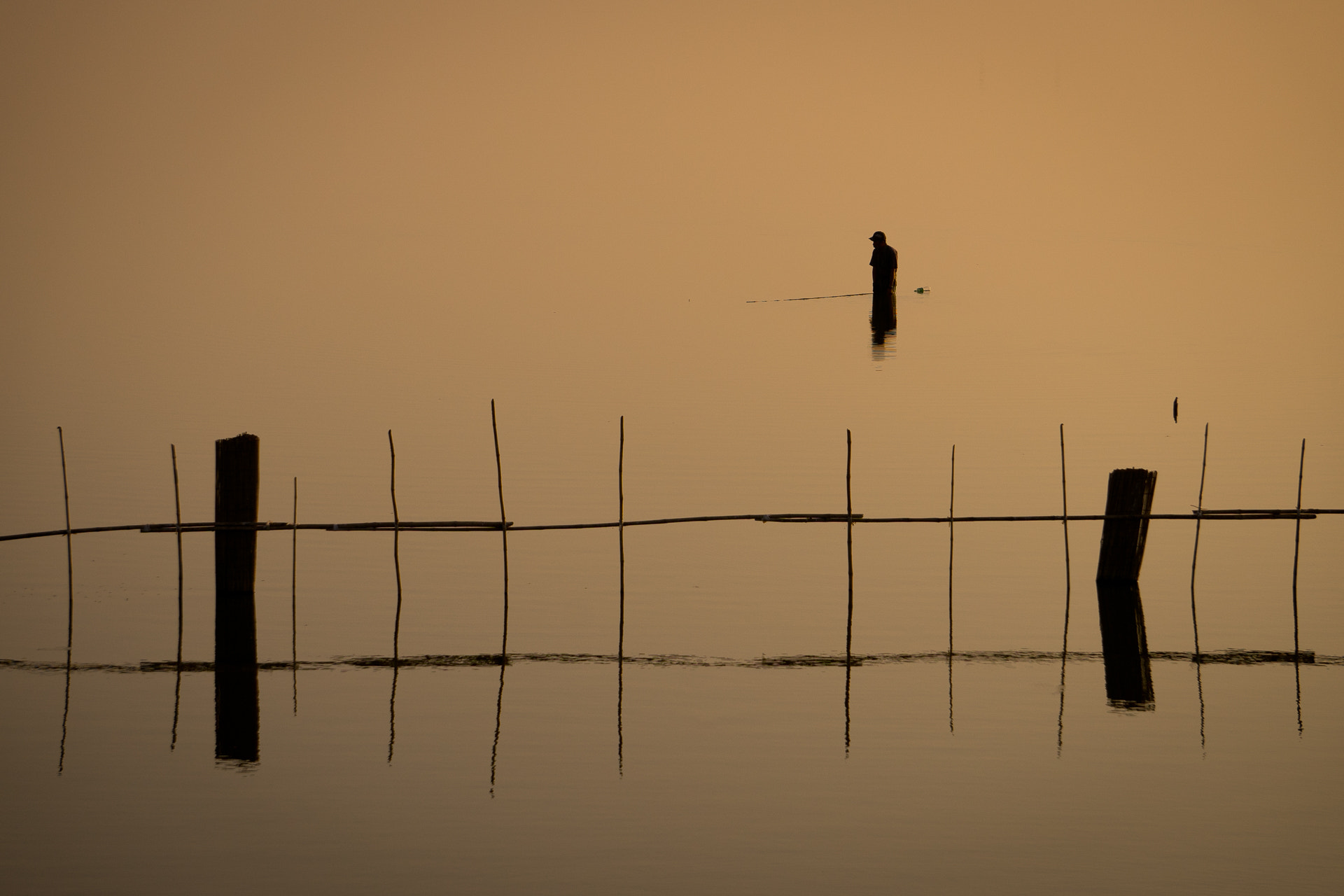 Sony E 55-210mm F4.5-6.3 OSS sample photo. Lonely fisherman photography