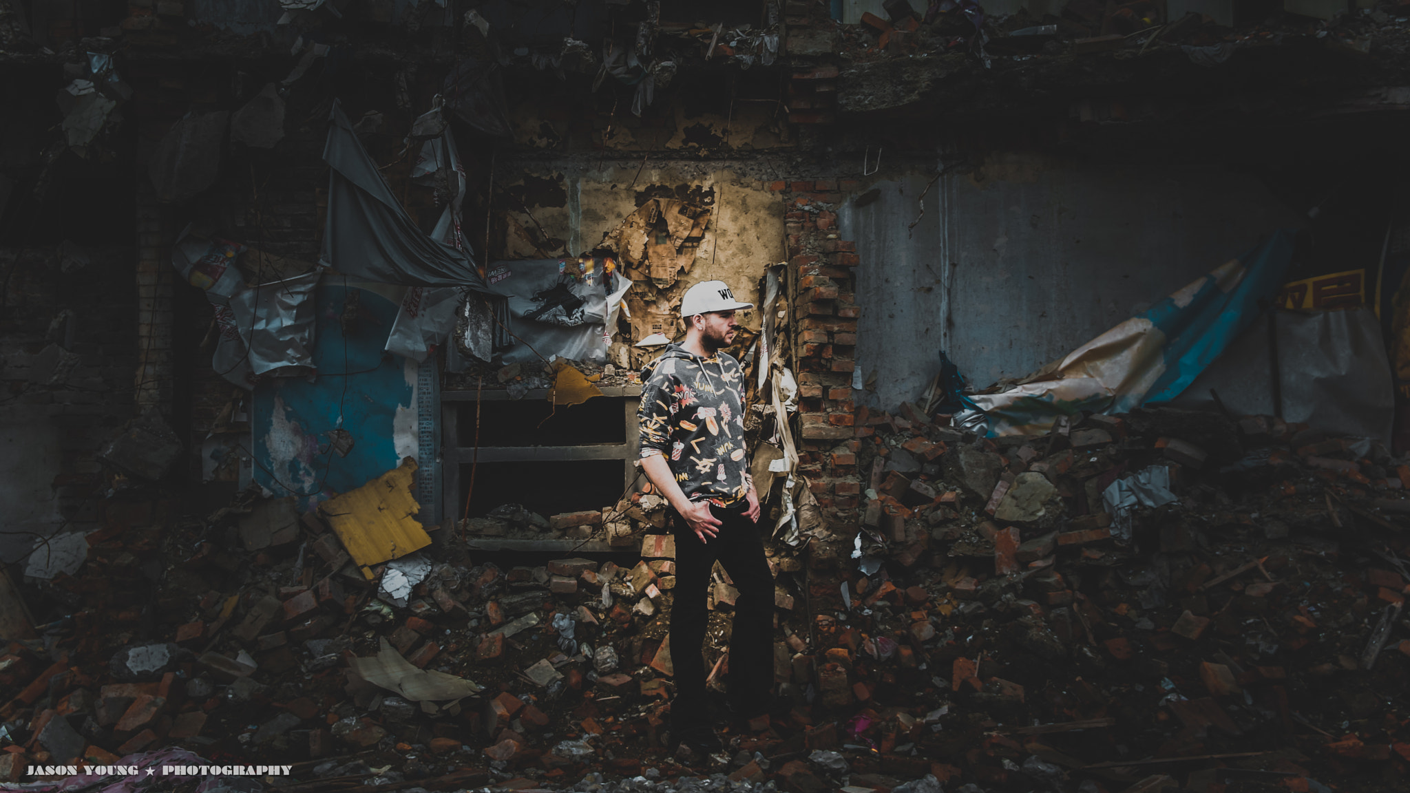 Sigma 17-50mm F2.8 EX DC HSM sample photo. Man in rubble photography