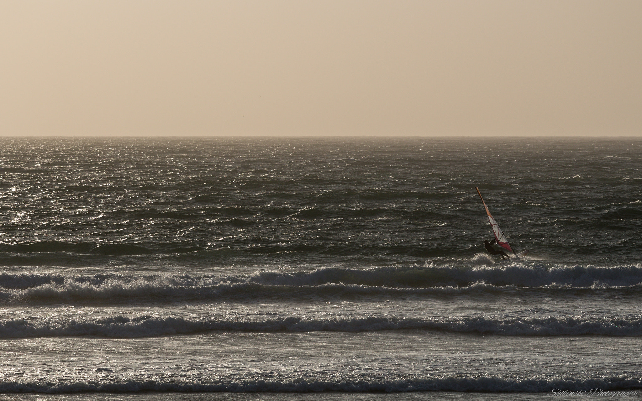 Canon EOS 100D (EOS Rebel SL1 / EOS Kiss X7) + Canon EF 70-200mm F4L IS USM sample photo. Hazy surfing photography