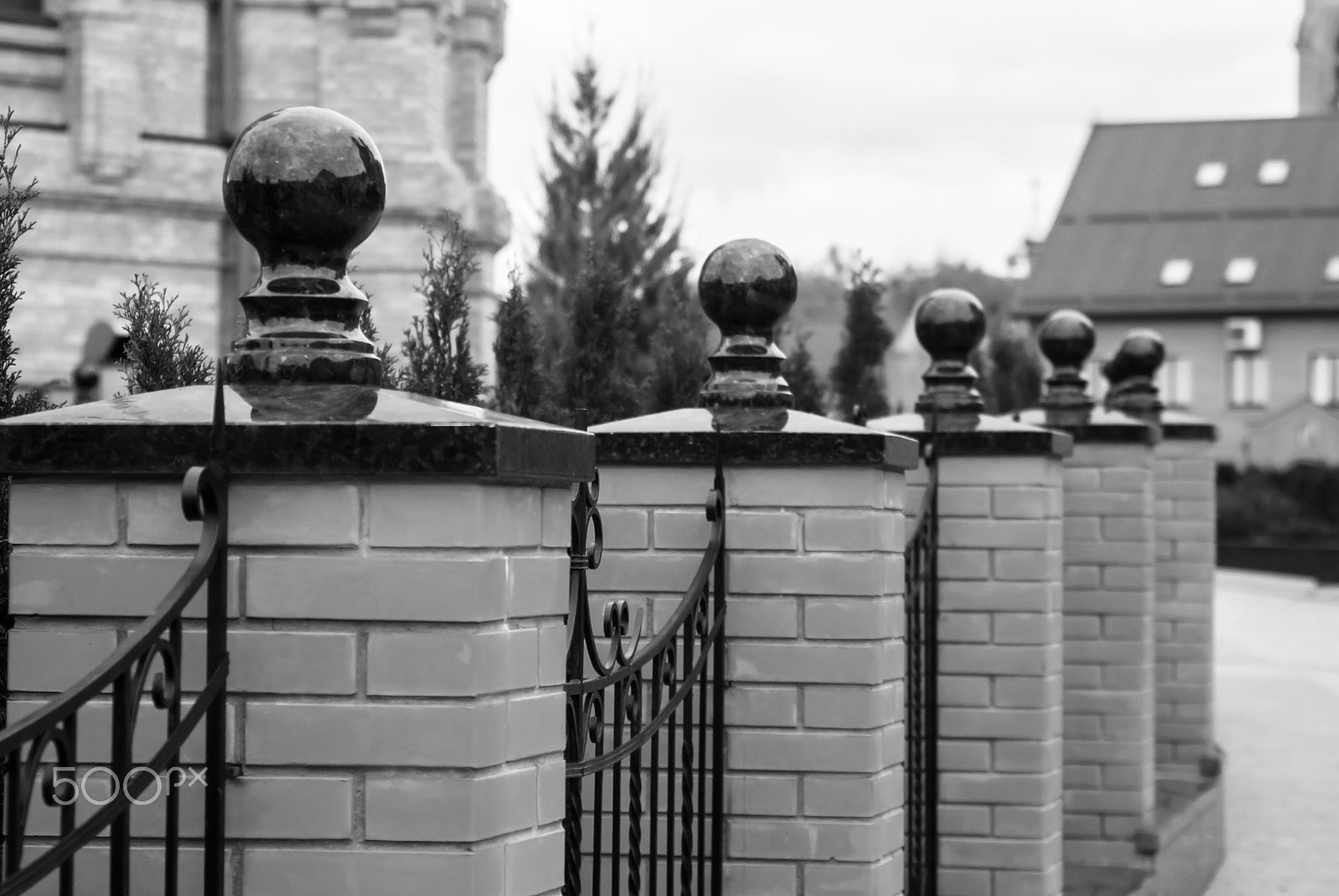 Nikon D80 + Sigma 24-70mm F2.8 EX DG Macro sample photo. Brick fence photography