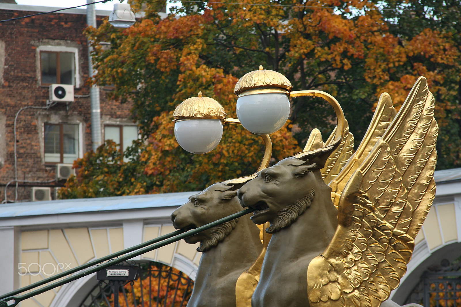 Sigma 18-125mm F3.8-5.6 DC OS HSM sample photo. Griffins on bank bridge photography
