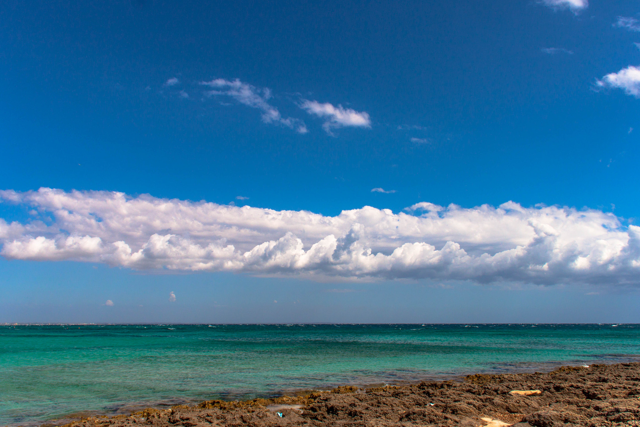 Canon EOS 500D (EOS Rebel T1i / EOS Kiss X3) + Sigma 18-125mm f/3.5-5.6 DC IF ASP sample photo. Clouds on the sea photography