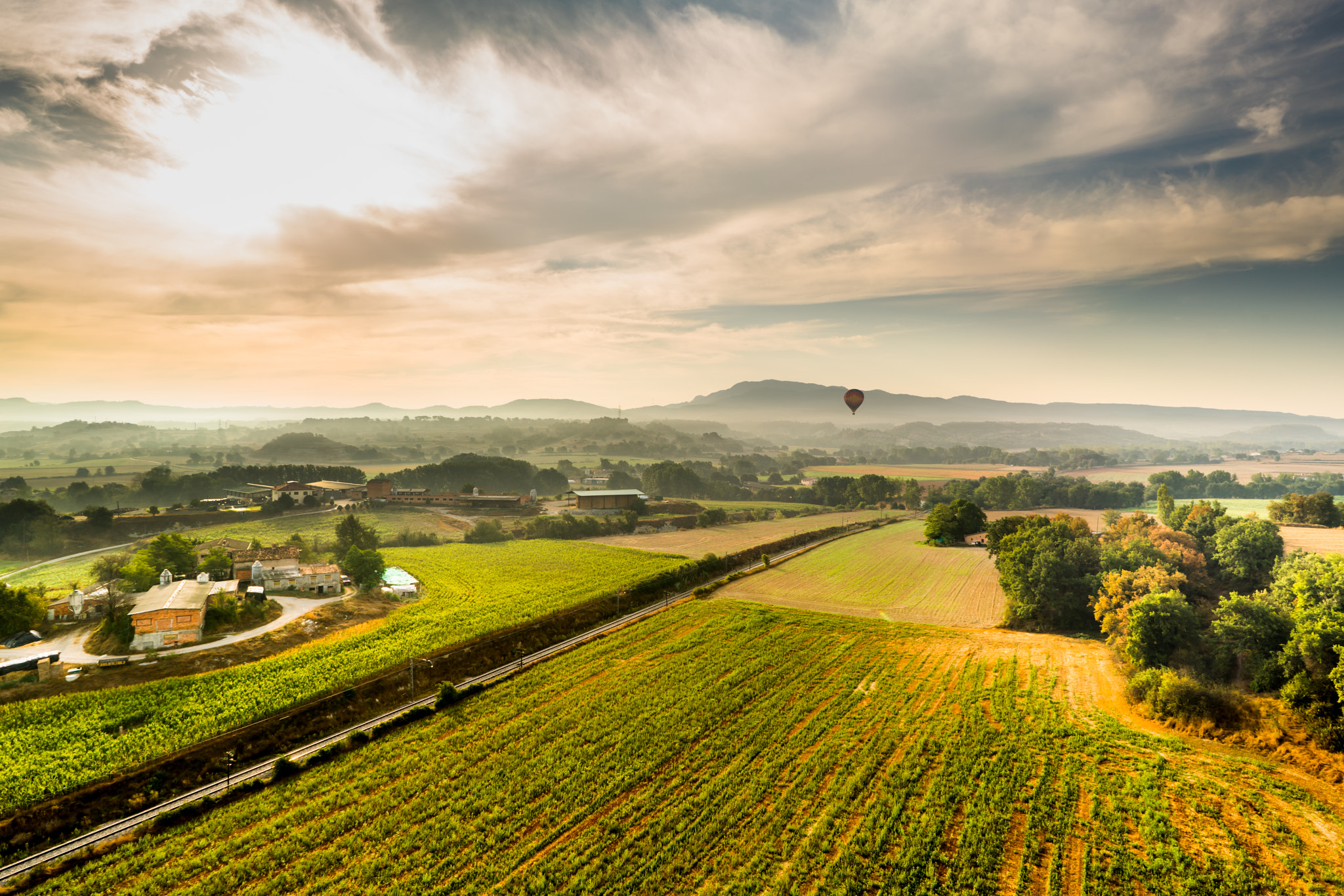 Sony FE 28mm F2 sample photo. Airballoon countryside photography