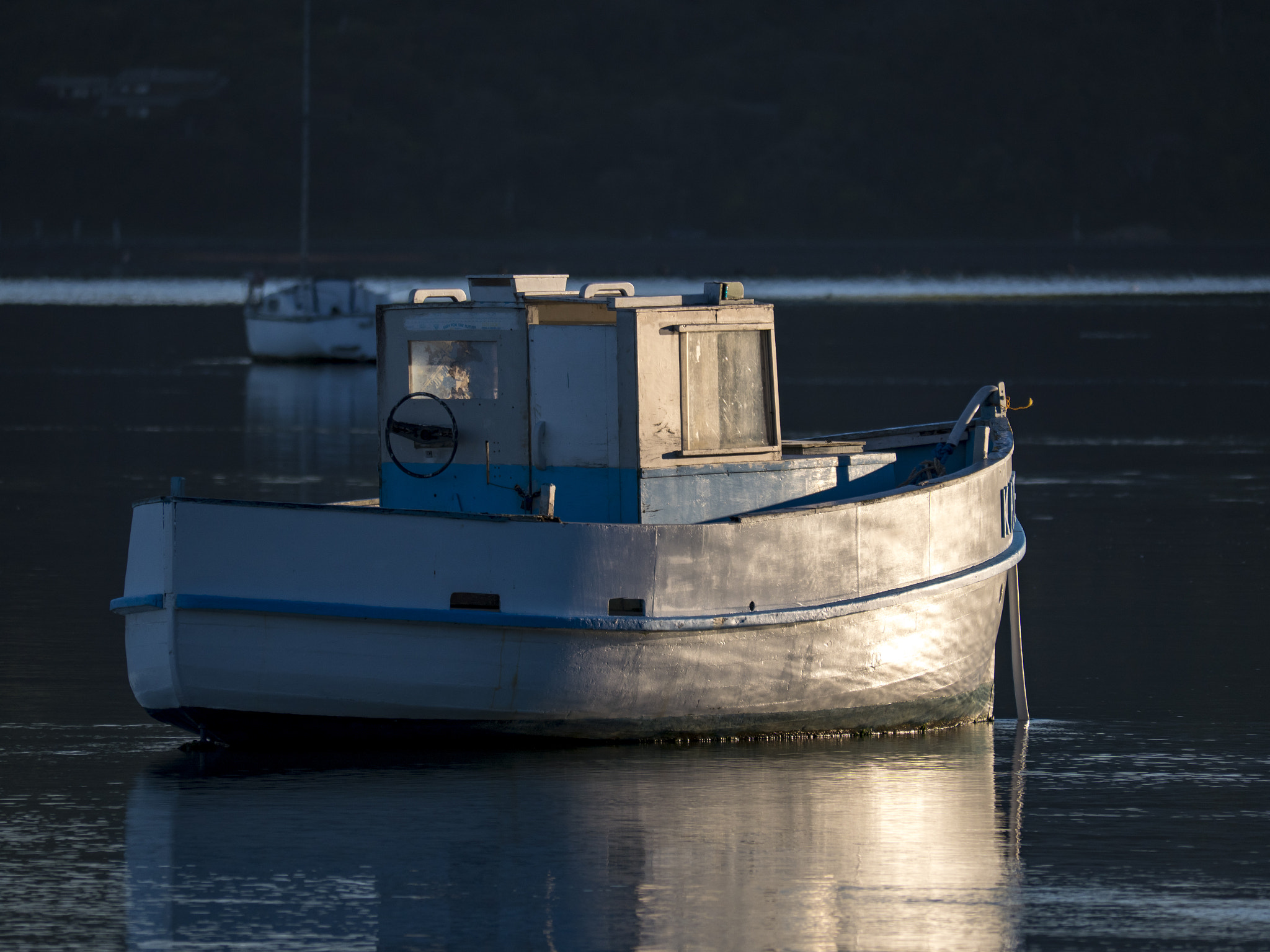 Panasonic Lumix DMC-GX8 sample photo. Old boat in calm mooring photography
