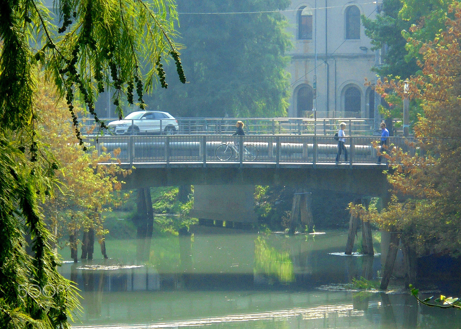 Sony Cyber-shot DSC-W810 sample photo. Girl cycling on bridge photography