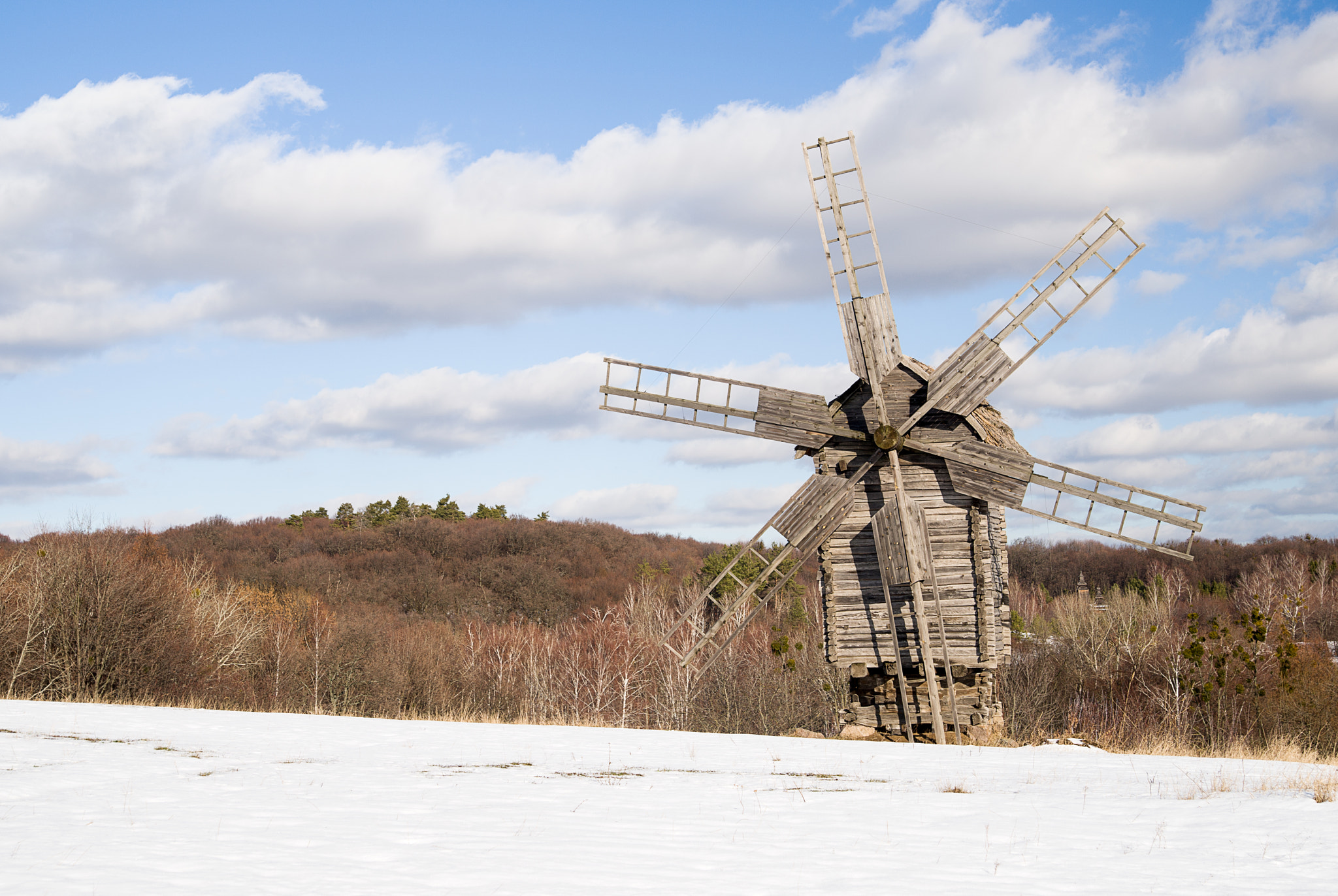 Nikon D800 + Tamron AF 28-75mm F2.8 XR Di LD Aspherical (IF) sample photo. Windmill against a blue sky with clouds in winter photography