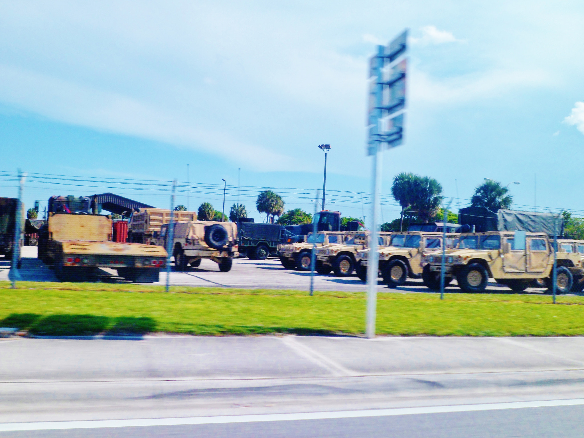Samsung PL120,PL121 / VLUU PL120,PL121 sample photo. Grey army trucks photography