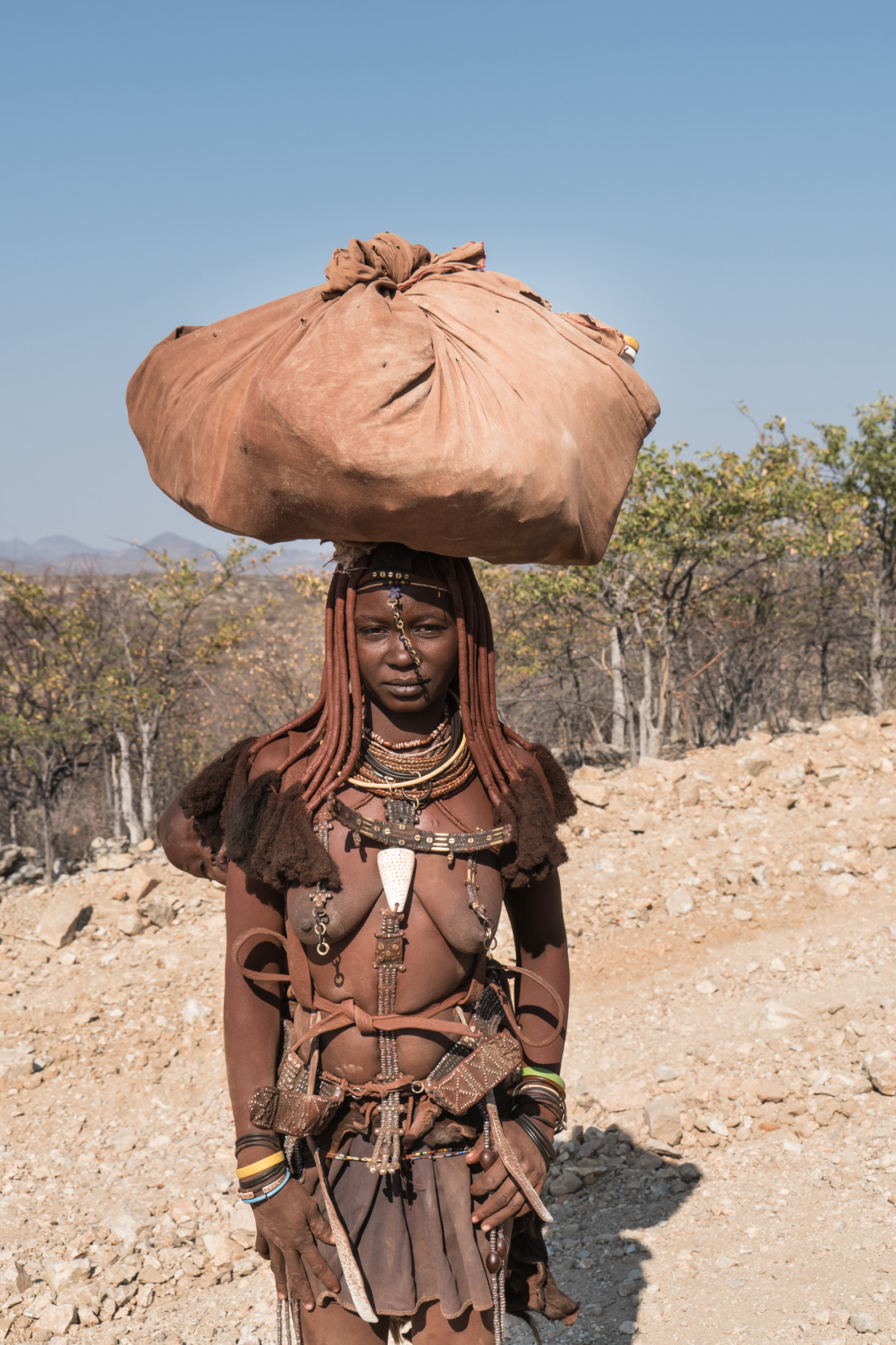 Sony E 18-200mm F3.5-6.3 OSS sample photo. Getting water, kunene river, namibia photography