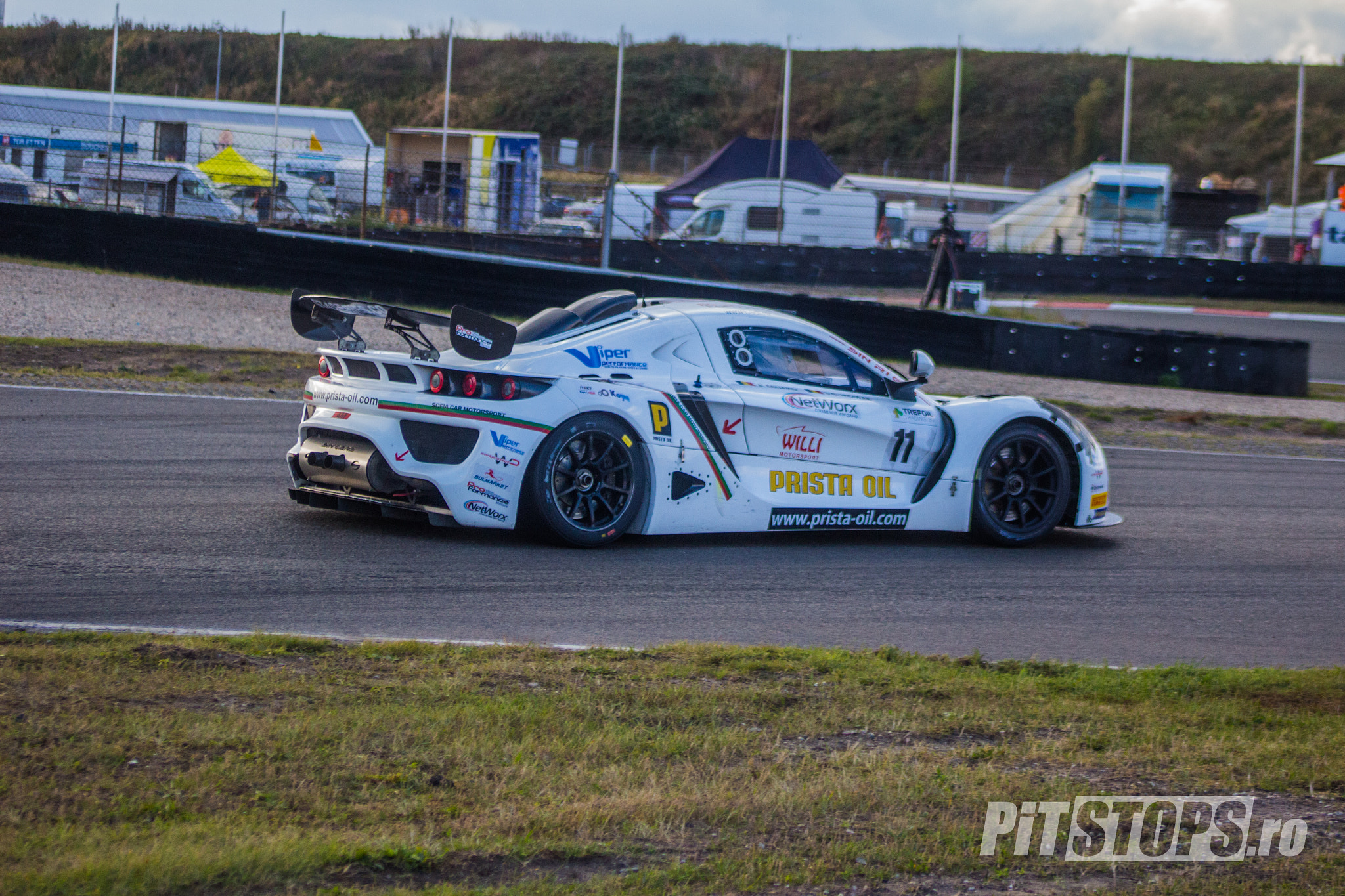 Canon EF 75-300mm f/4-5.6 USM sample photo. Euro gt4 zandvoort race 2 - sin r1 exits the chicane photography