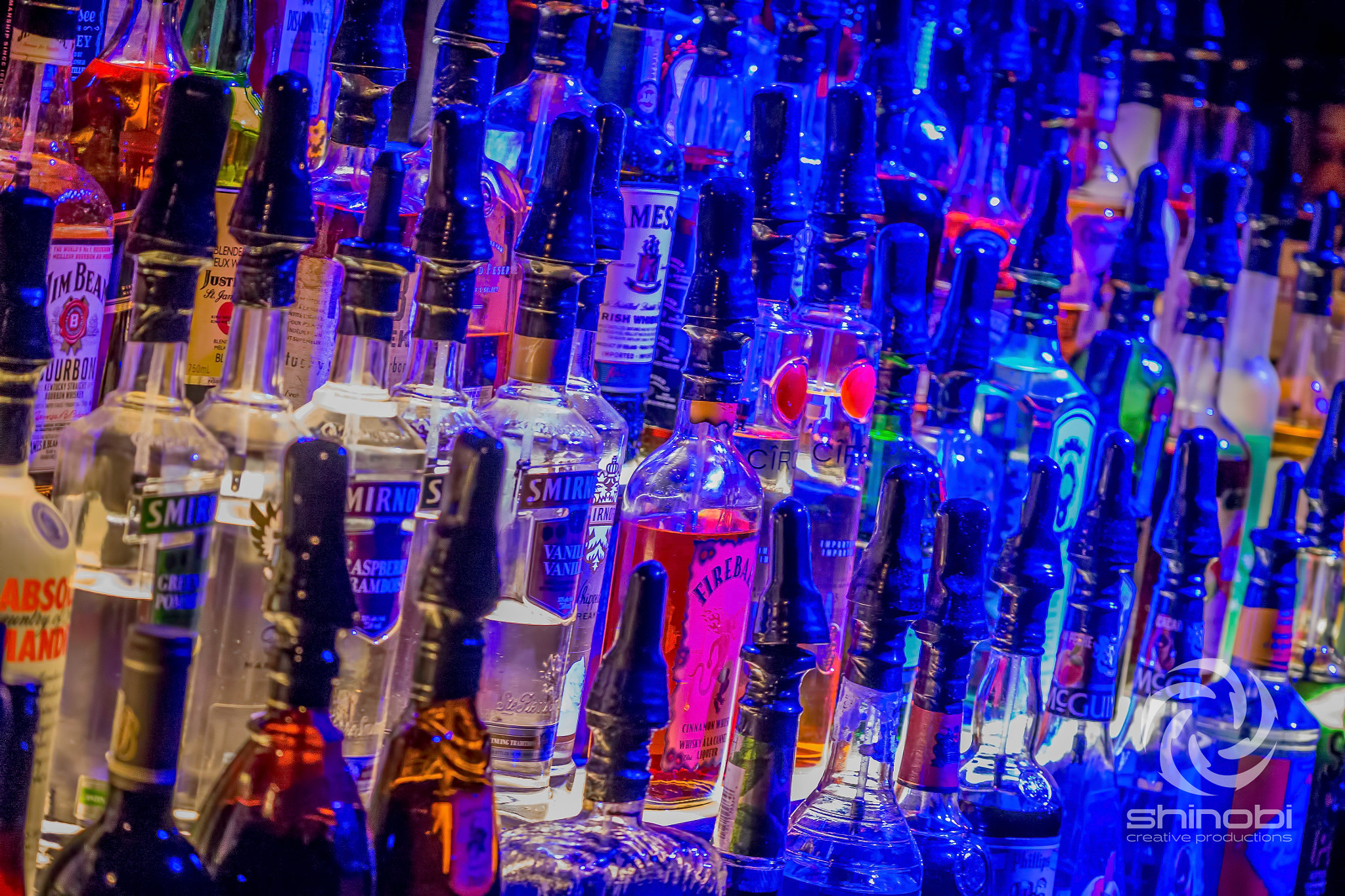Panasonic Lumix G X Vario 35-100mm F2.8 OIS sample photo. Neon bottles photography