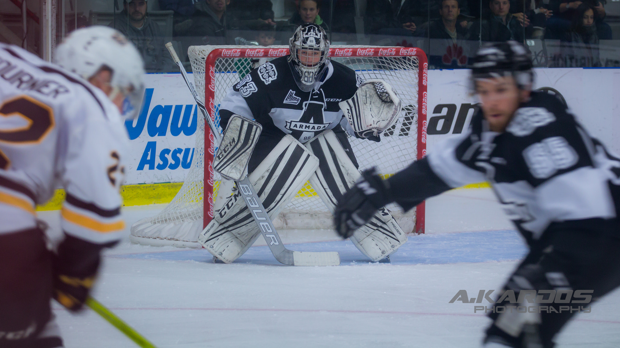 Canon EOS 700D (EOS Rebel T5i / EOS Kiss X7i) + Canon EF 70-200mm F4L USM sample photo. Steady goaltender - samuel montembeault # 33 photography