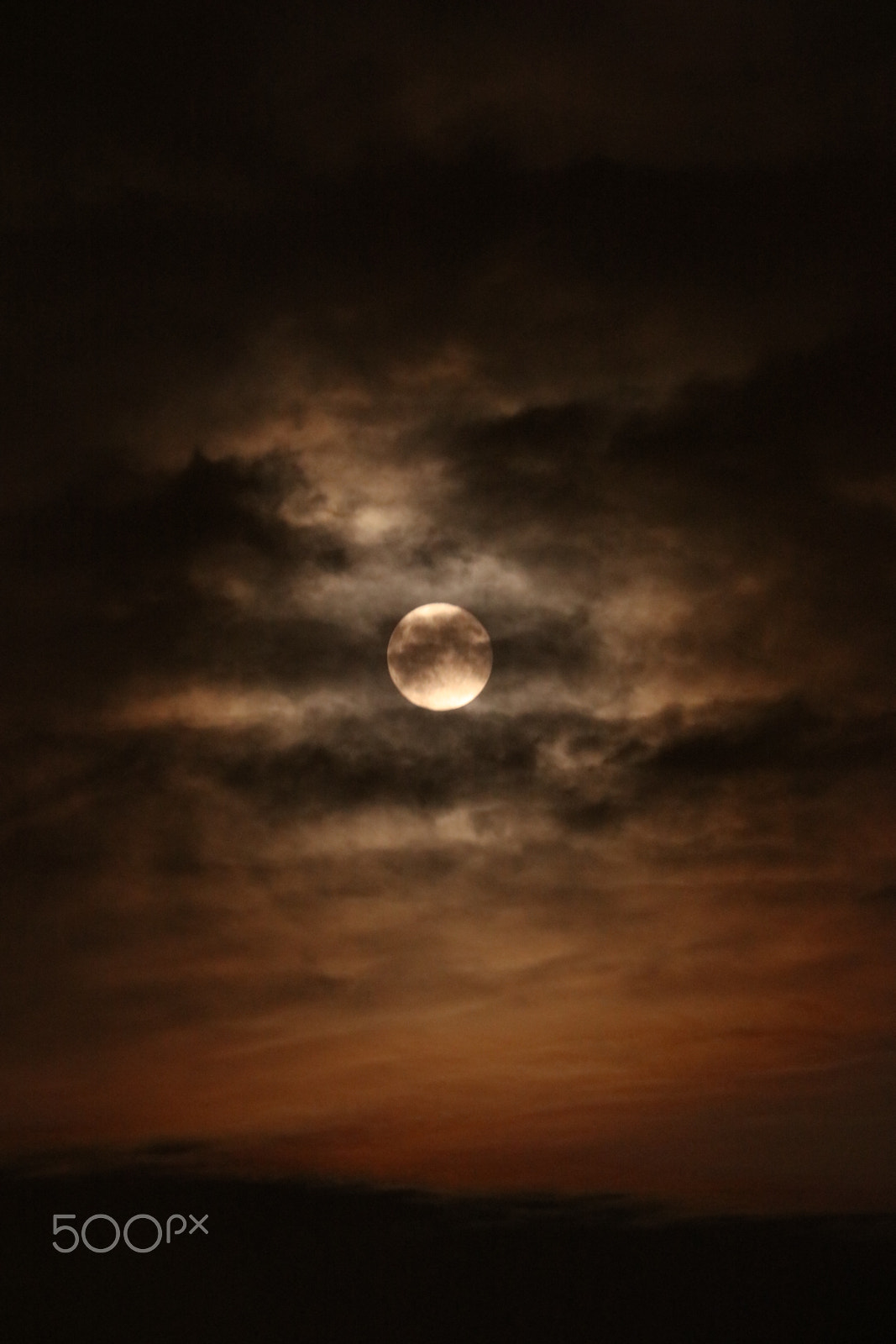 Canon EF 70-300mm F4-5.6L IS USM sample photo. Moon in dark clouds photography