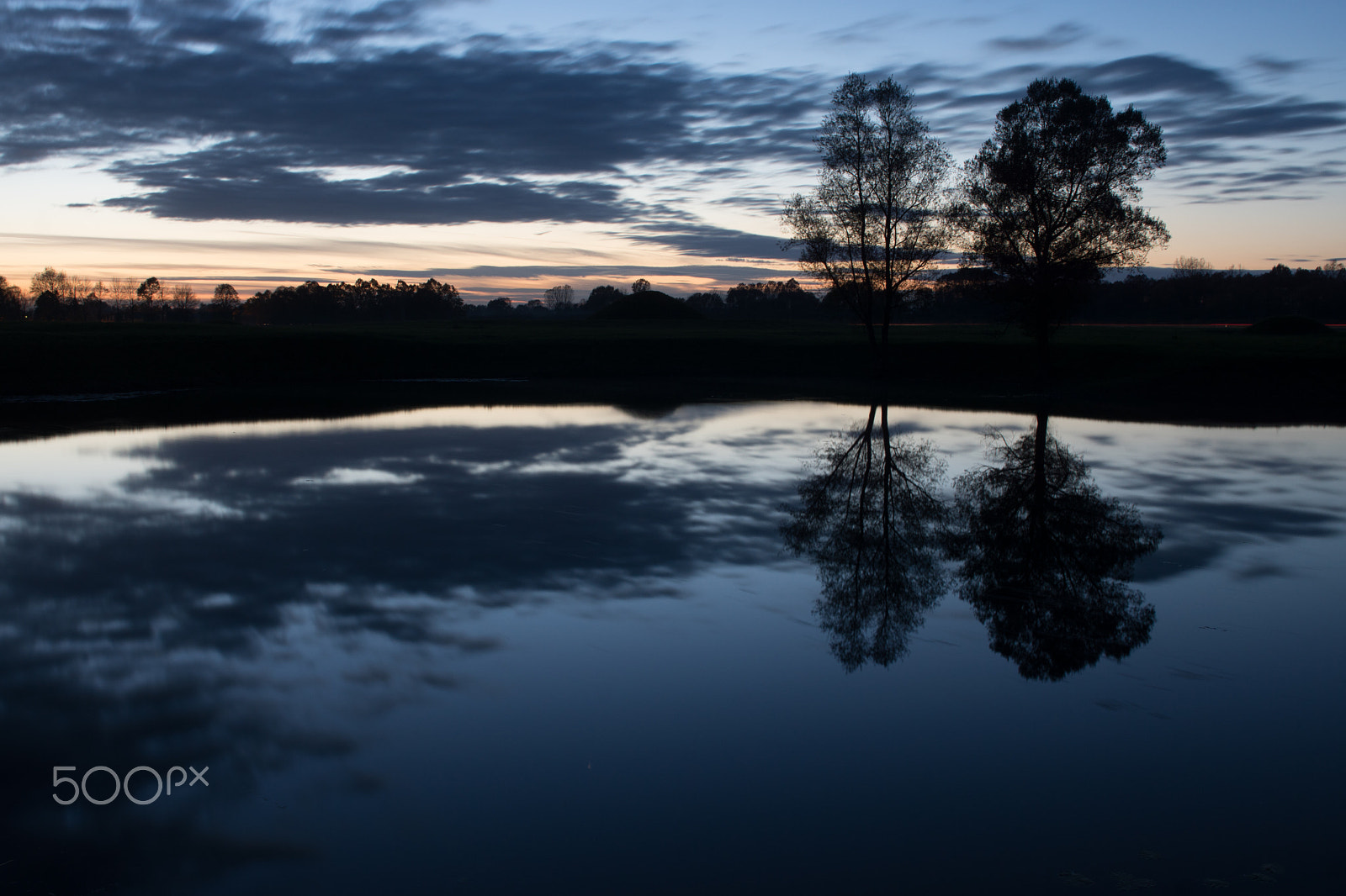 Sony ILCA-77M2 + 24-70mm F2.8 sample photo. Lake and trees at twilight photography